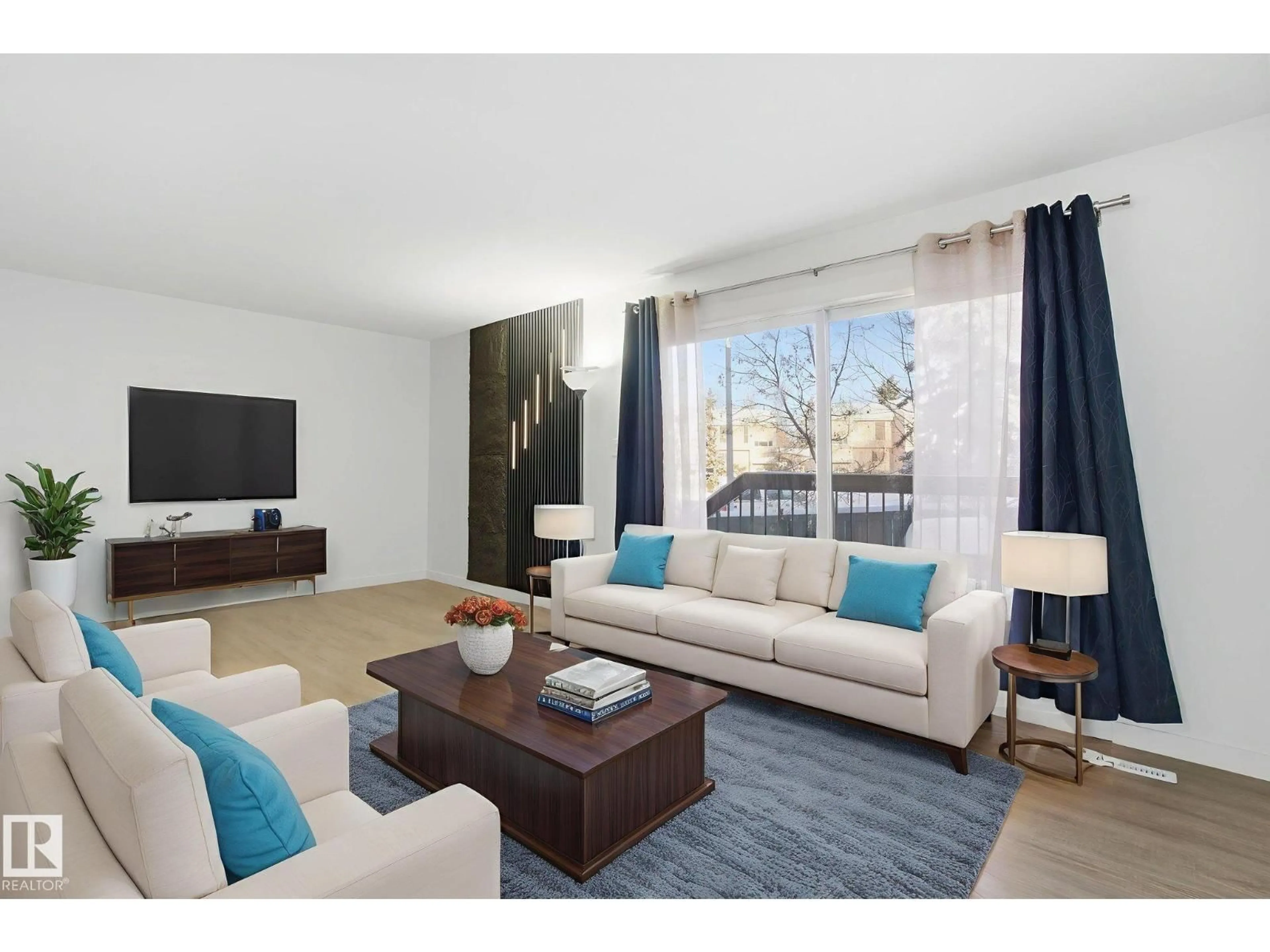 Living room with furniture, unknown for 5538 145 AV, Edmonton Alberta T5A3R3