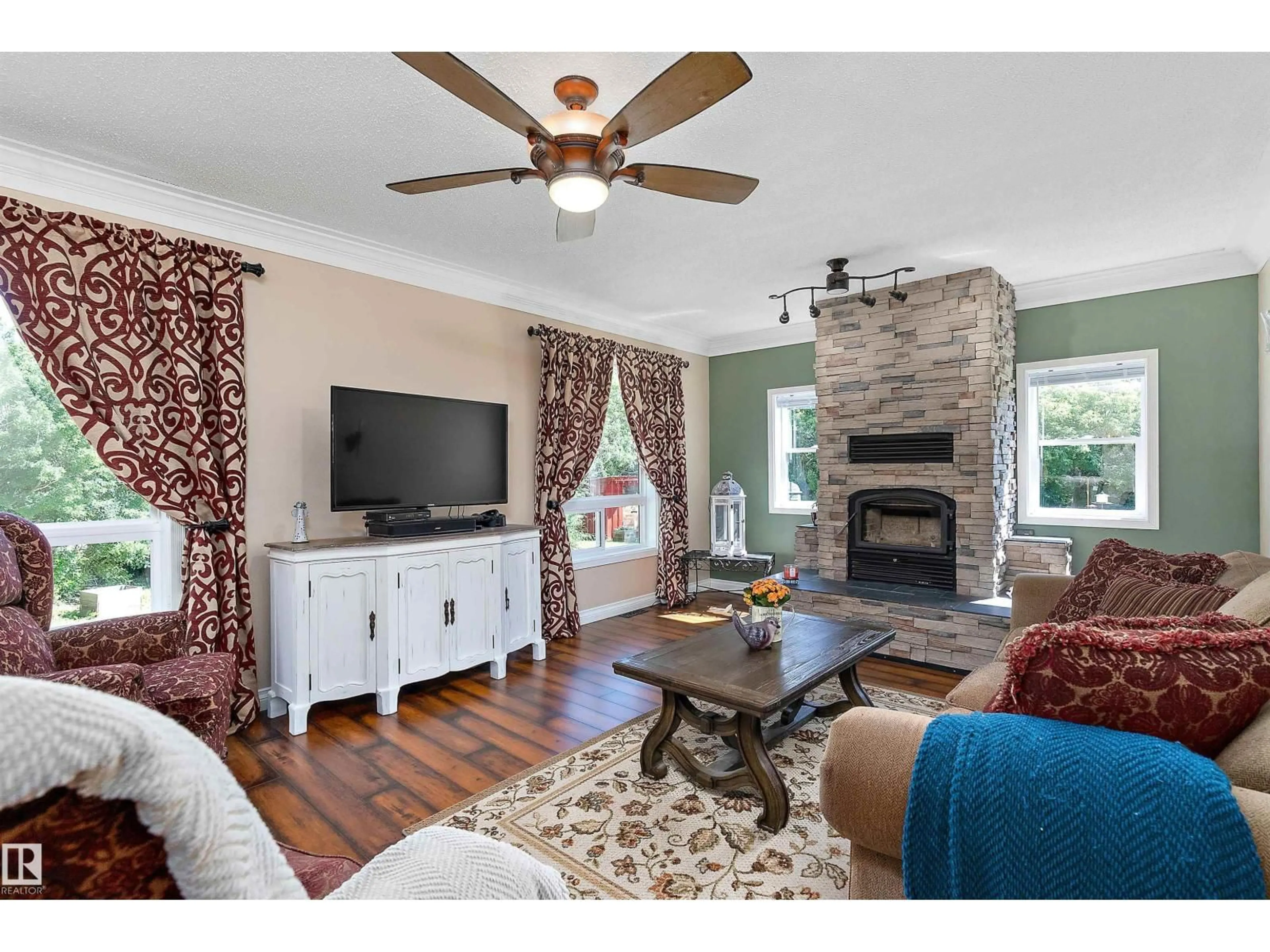 Living room with furniture, unknown for 48114 RGE RD 262, Rural Leduc County Alberta T0C1Z0