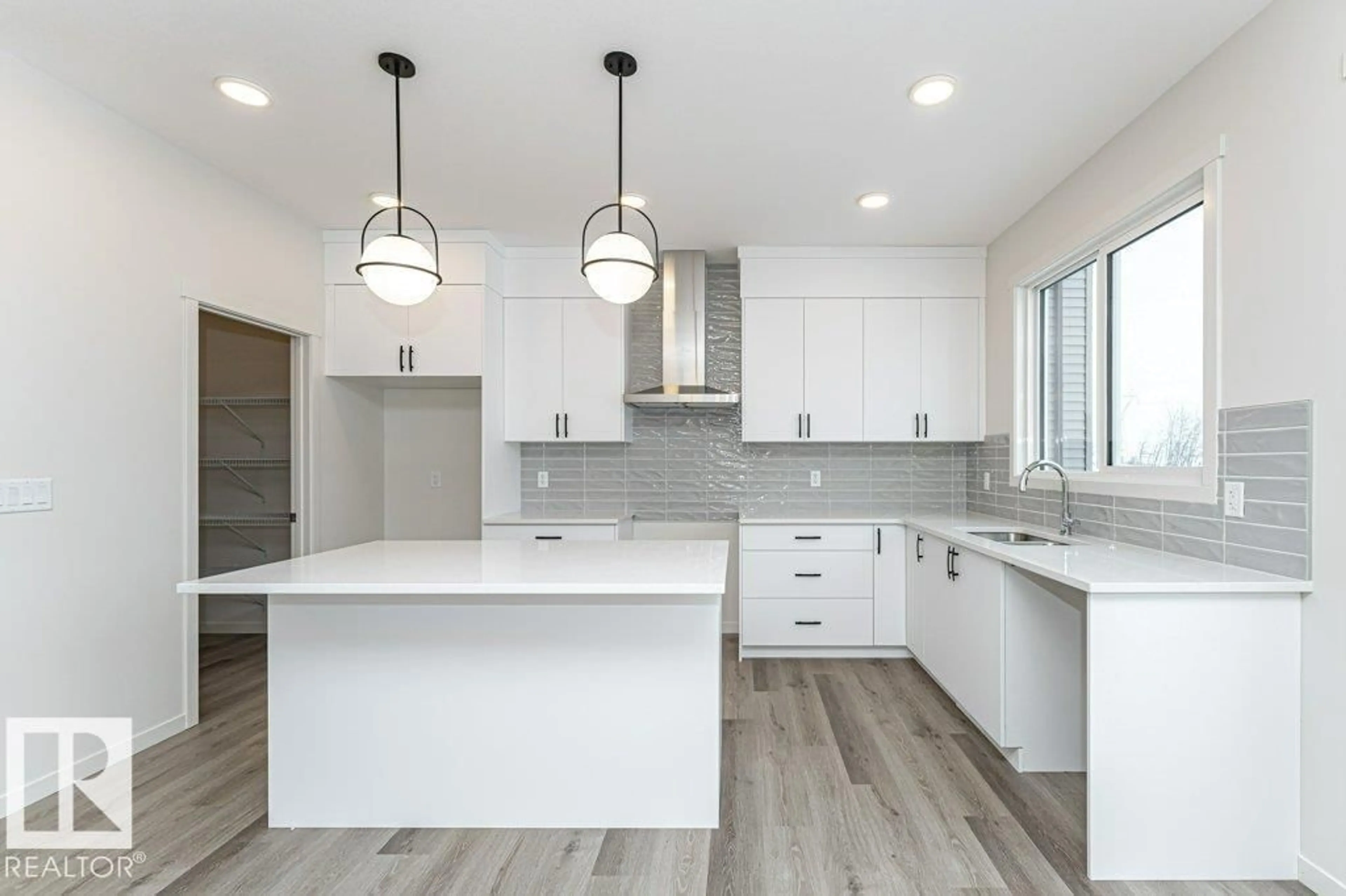 Open concept kitchen, unknown for 2420 EGRET LO, Edmonton Alberta T6M3G9