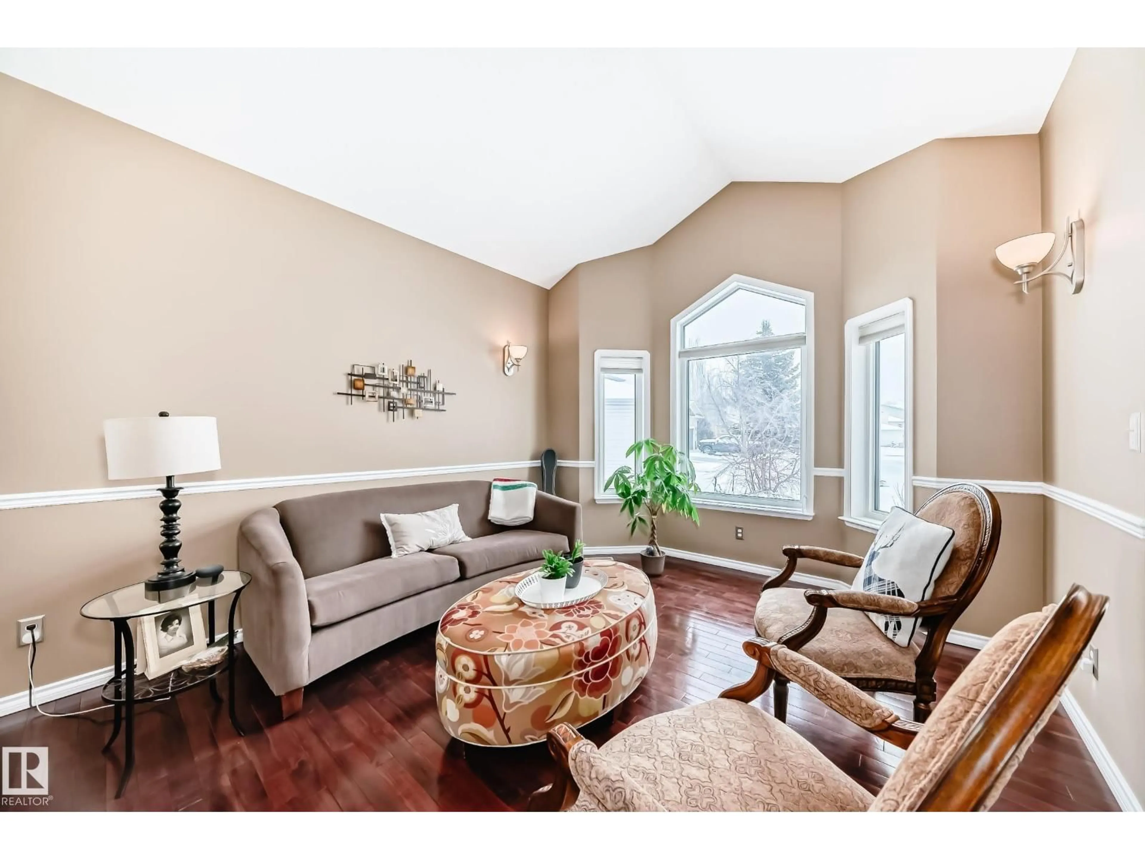 Living room with furniture, wood/laminate floor for 161 HIGHLAND WY, Sherwood Park Alberta T8A5R2