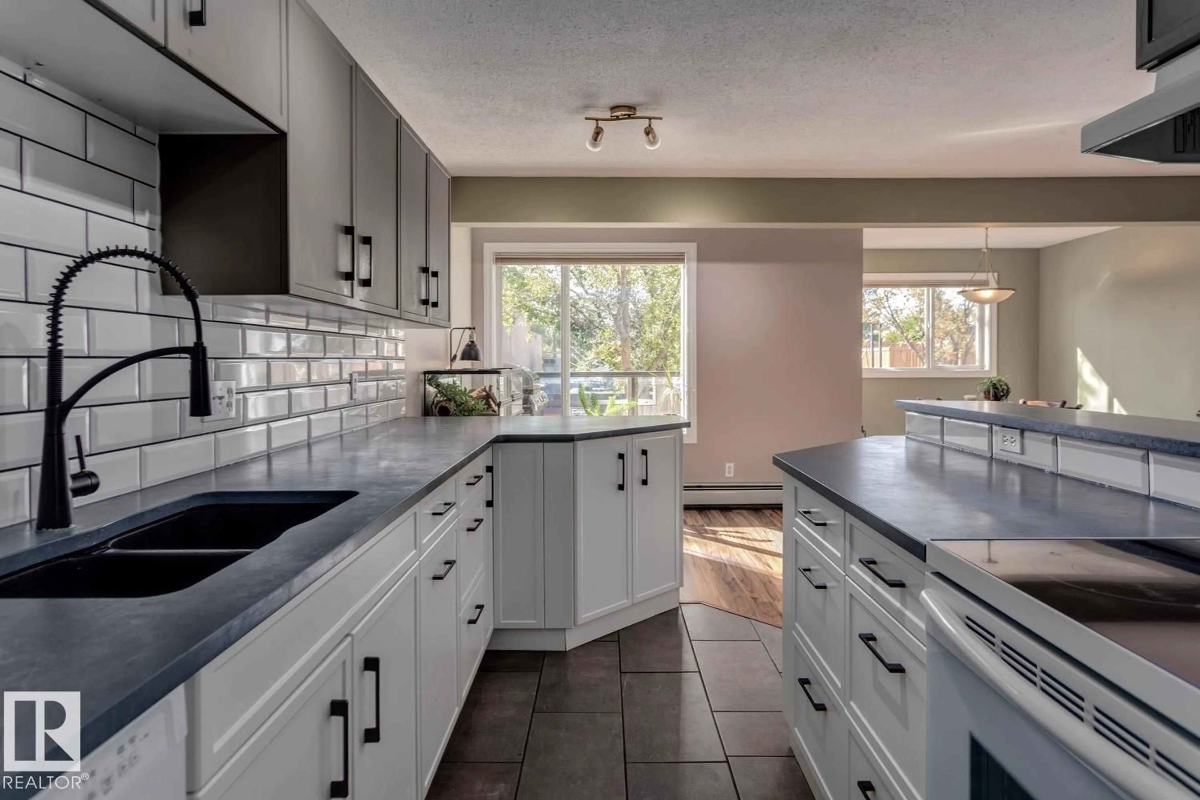 Open concept kitchen, ceramic/tile floor for #209 - 11033 127 ST, Edmonton Alberta T5M0T3