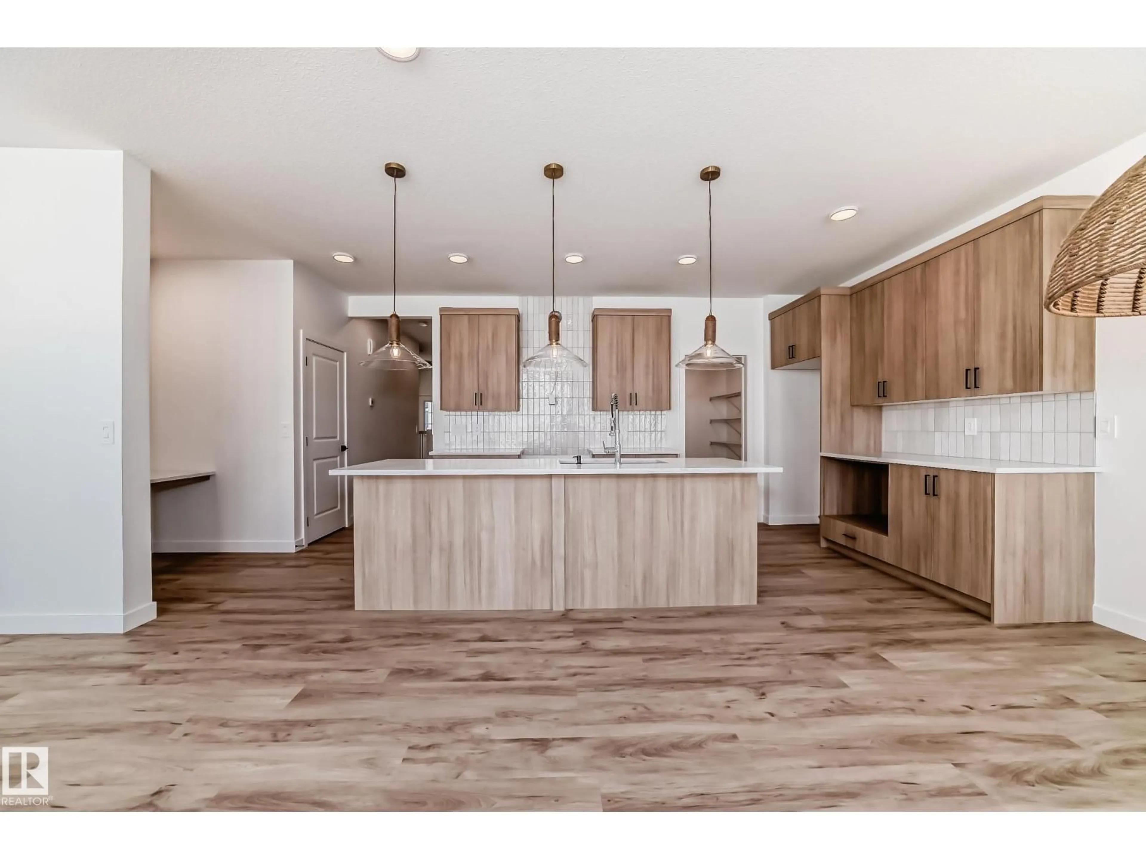 Open concept kitchen, wood/laminate floor for NW - 20624 43 AV, Edmonton Alberta T6M3E3