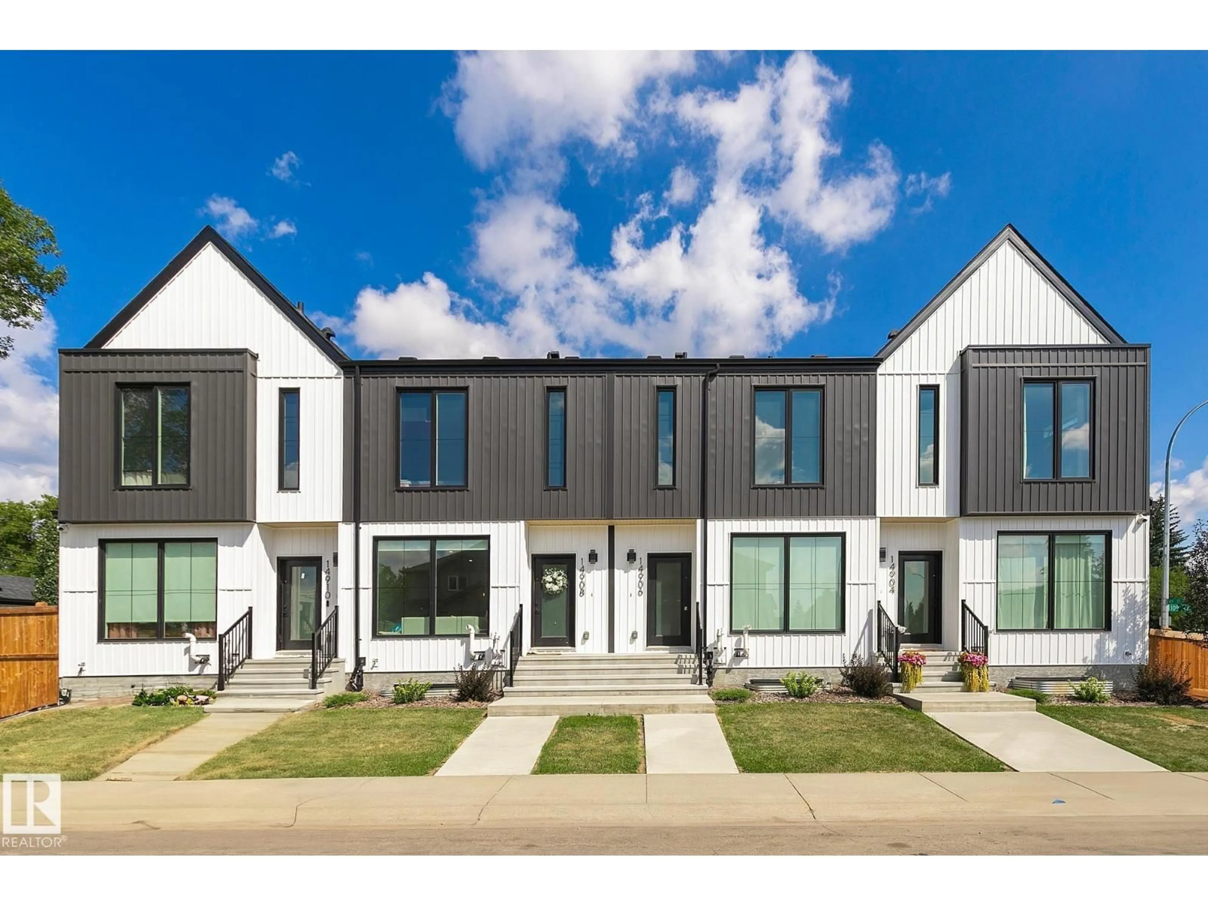Home with vinyl exterior material, street for 14904 109 AV, Edmonton Alberta T5P1M6