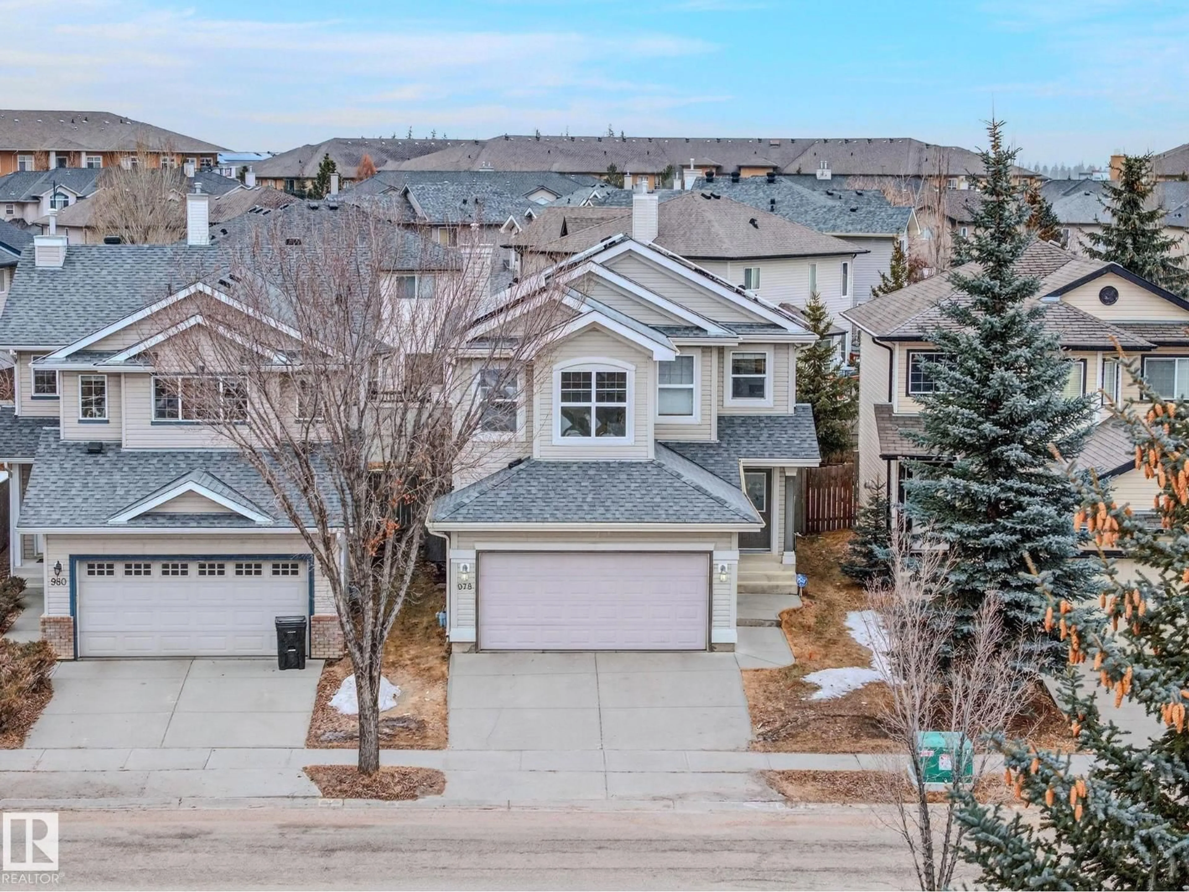 A pic from outside/outdoor area/front of a property/back of a property/a pic from drone, street for 978 RUTHERFORD RD SW, Edmonton Alberta T6W1W9