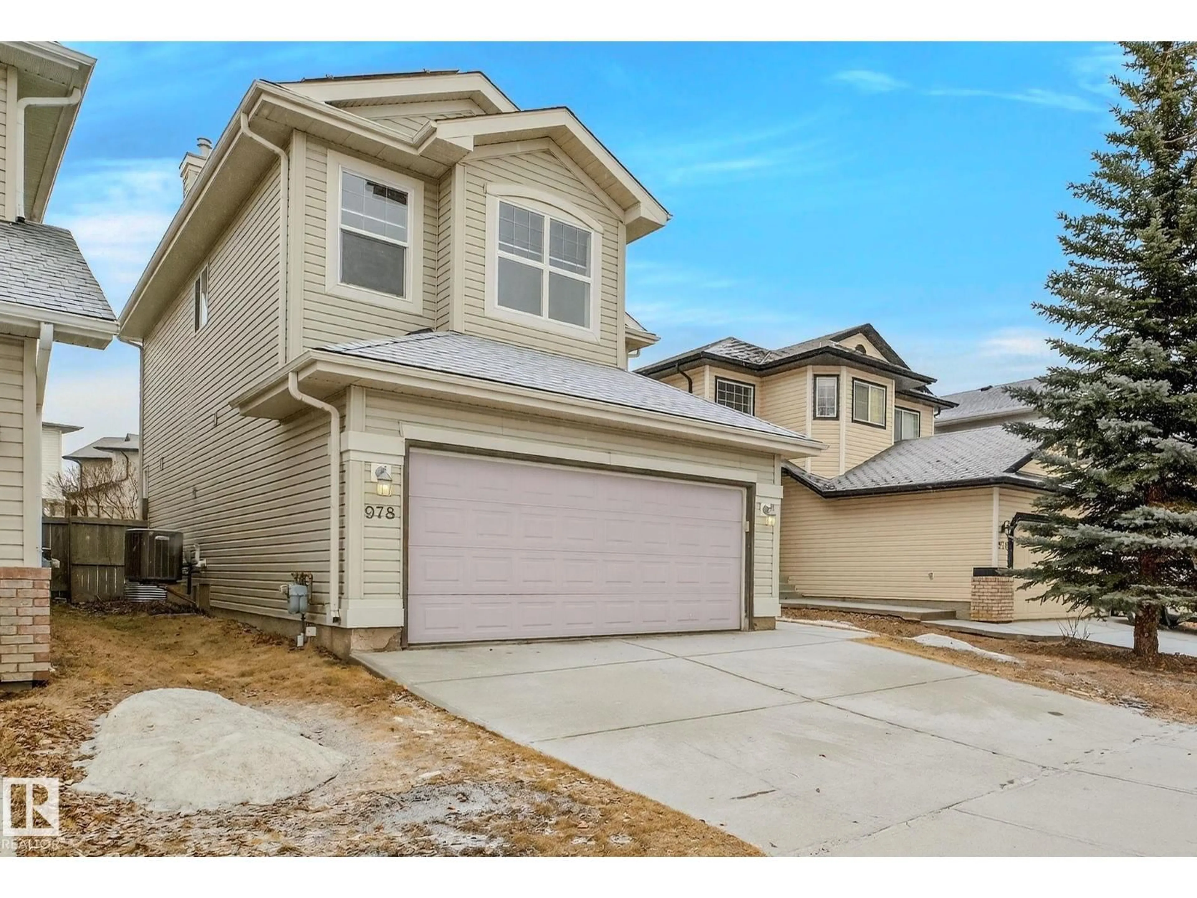 Home with vinyl exterior material, street for 978 RUTHERFORD RD SW, Edmonton Alberta T6W1W9