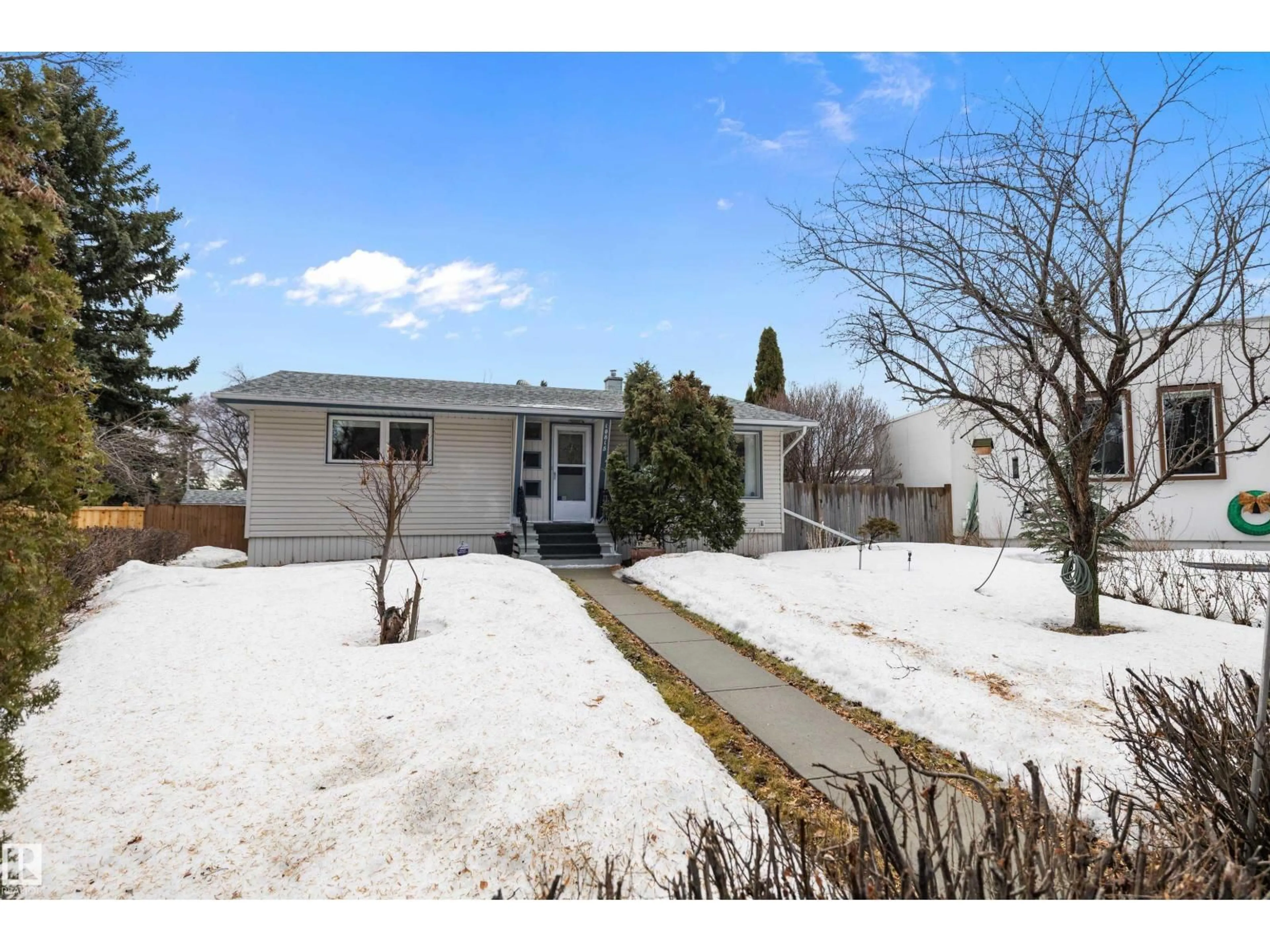 A pic from outside/outdoor area/front of a property/back of a property/a pic from drone, street for NW - 10815 131 ST, Edmonton Alberta T5M1B3