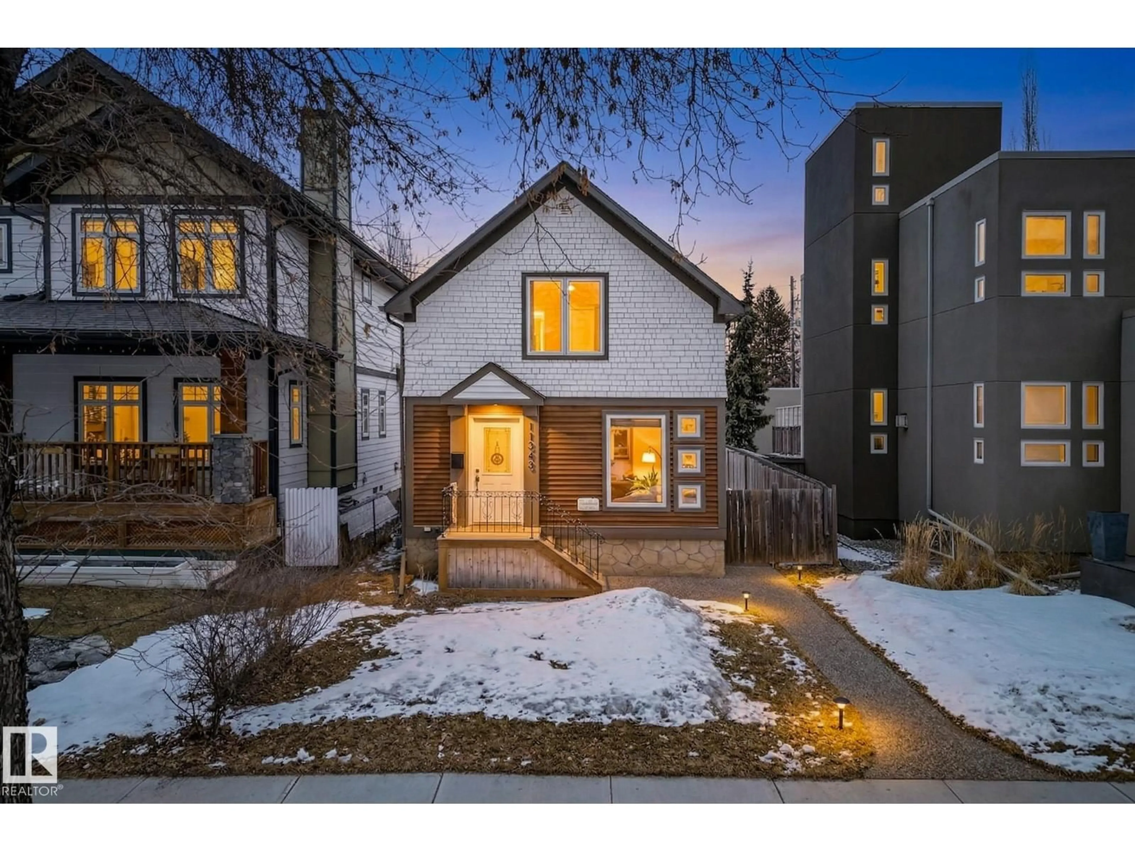 Home with brick exterior material, street for NW - 11343 67 ST, Edmonton Alberta T5B1L2