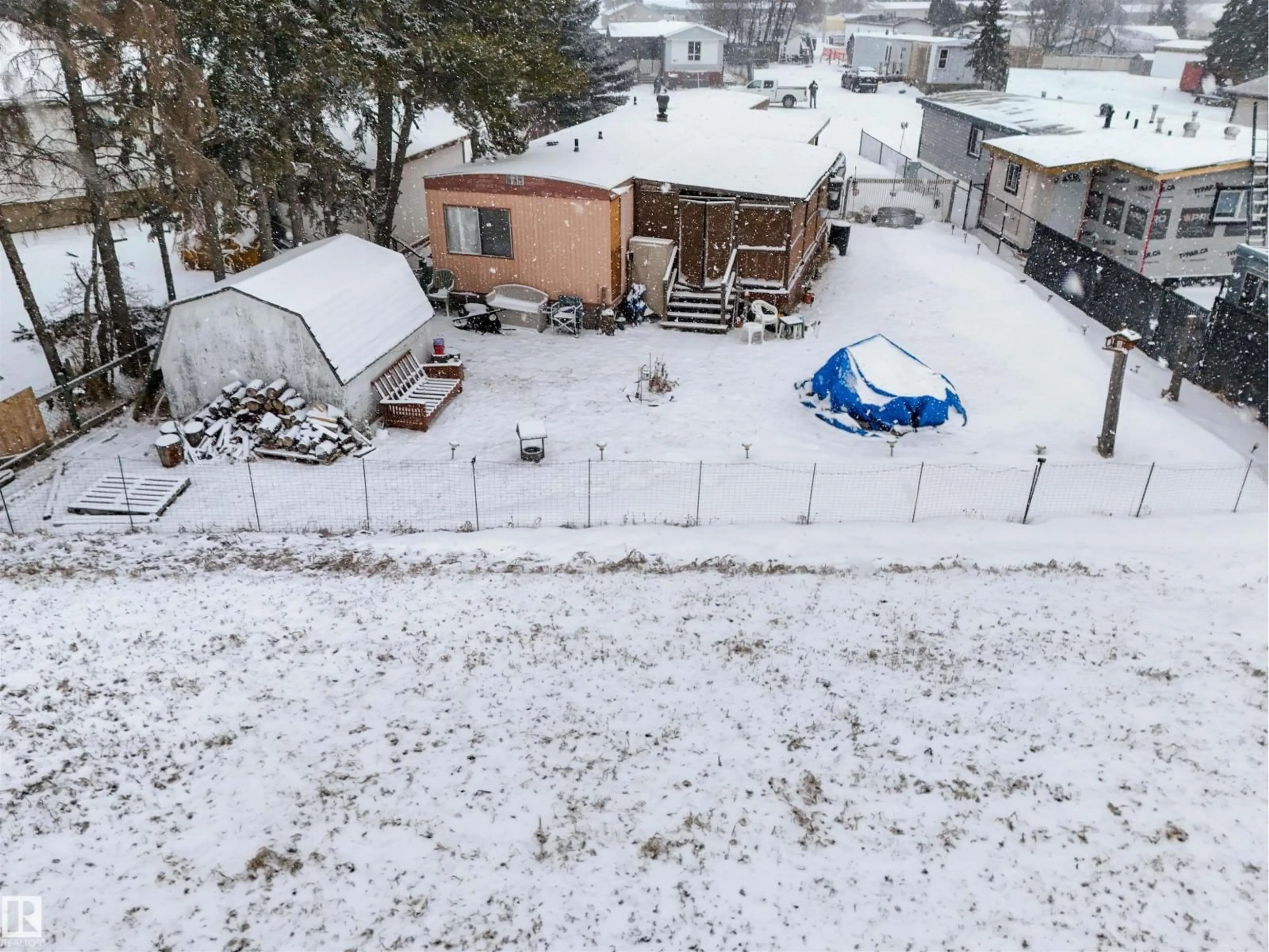A pic from outside/outdoor area/front of a property/back of a property/a pic from drone, unknown for 4824 56A ST, Drayton Valley Alberta T7A1J9