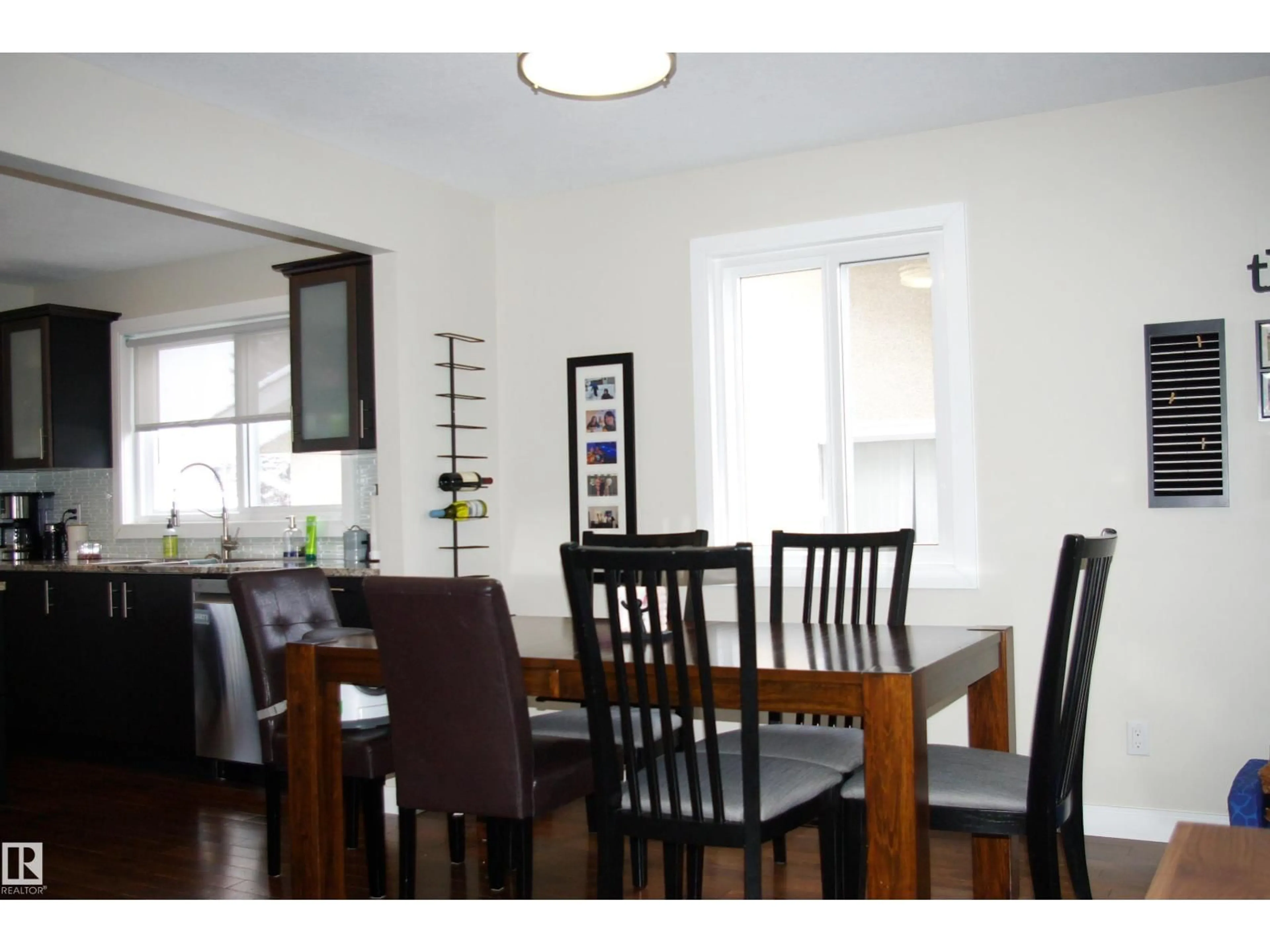 Dining room, wood/laminate floor for 11907 152A AV, Edmonton Alberta T5X1E7