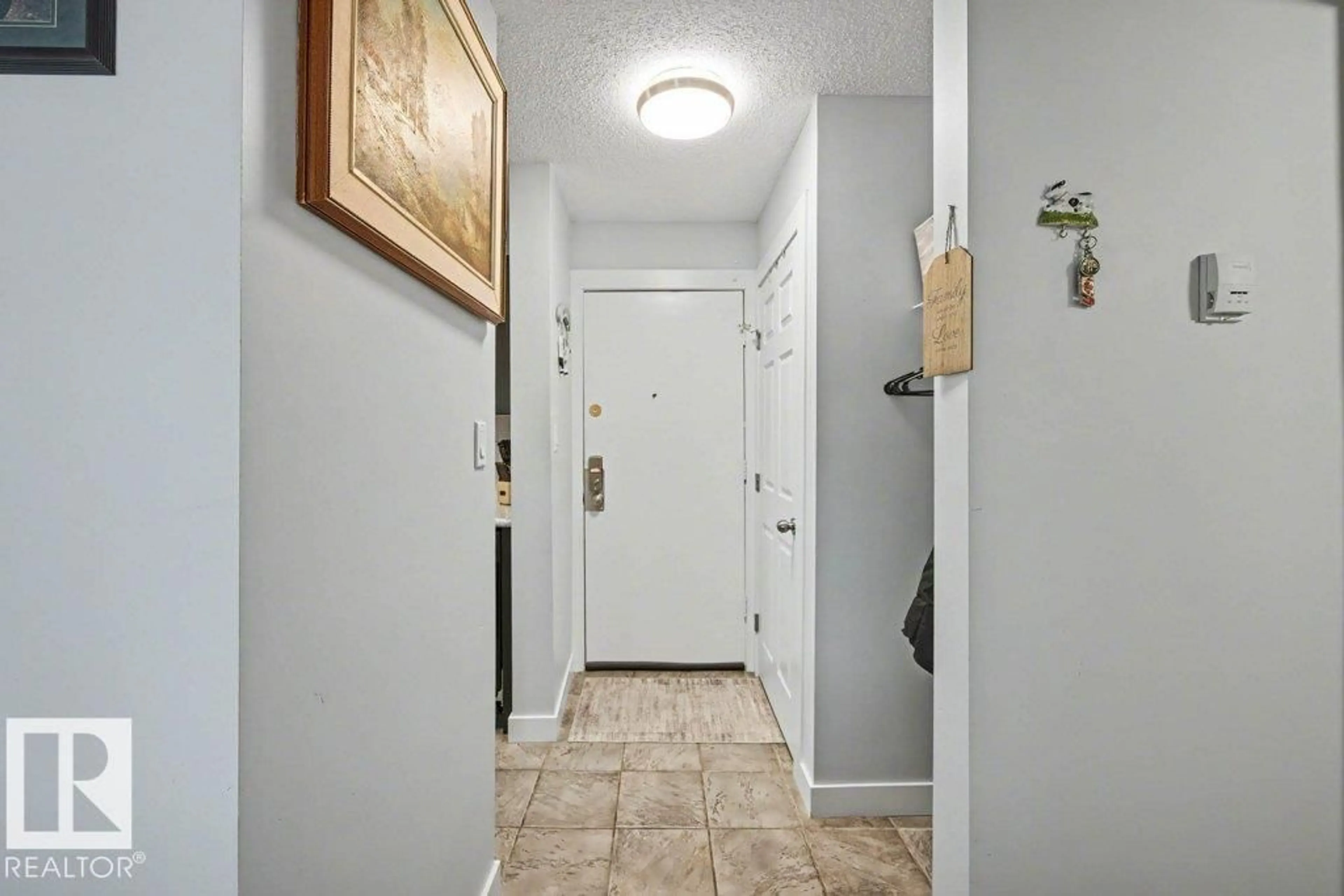 Indoor entryway for #102 - 15105 121 ST NW, Edmonton Alberta T5X2G3