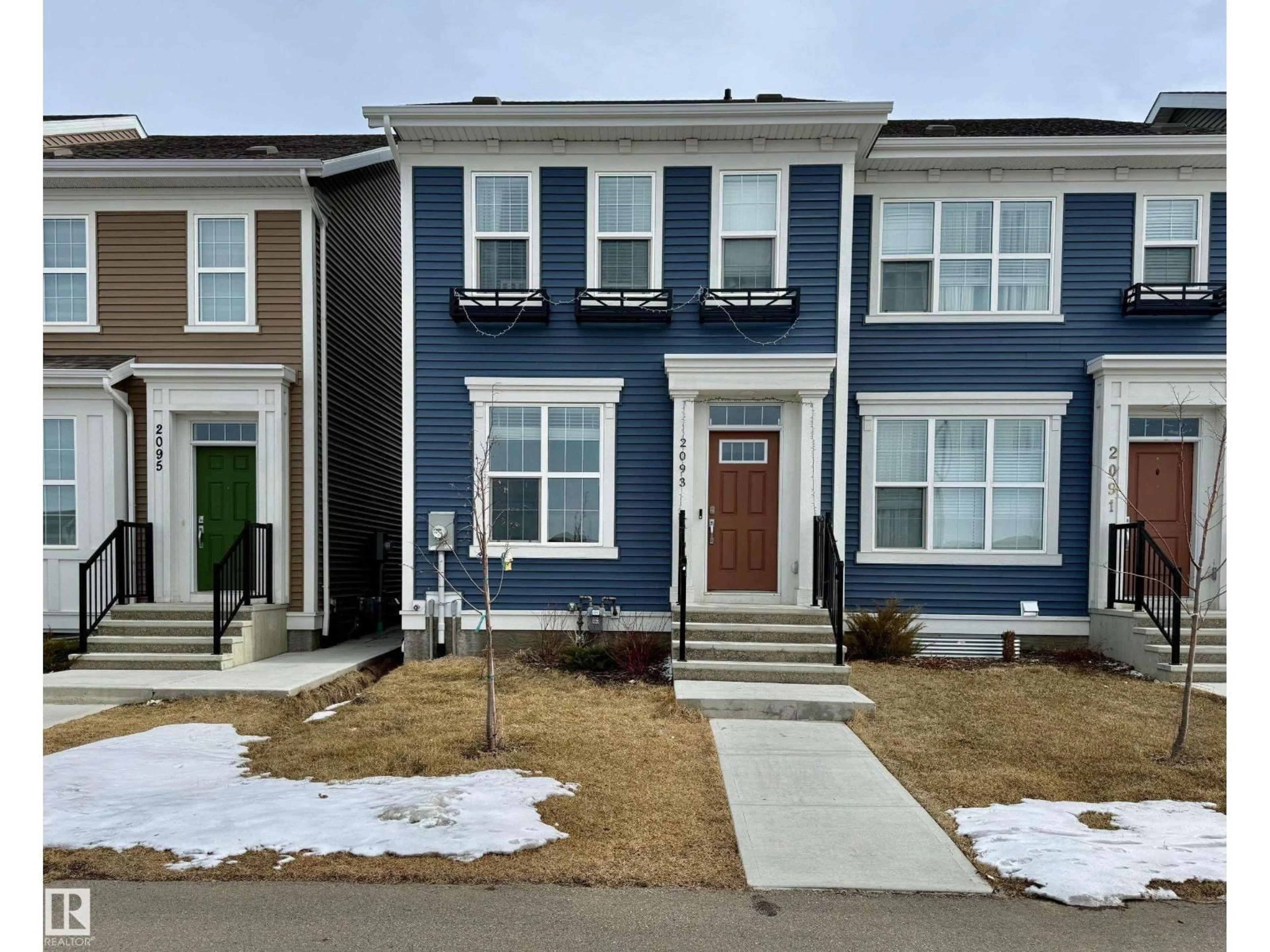 Home with vinyl exterior material, street for 2093 MAPLE RD, Edmonton Alberta T6T2S8