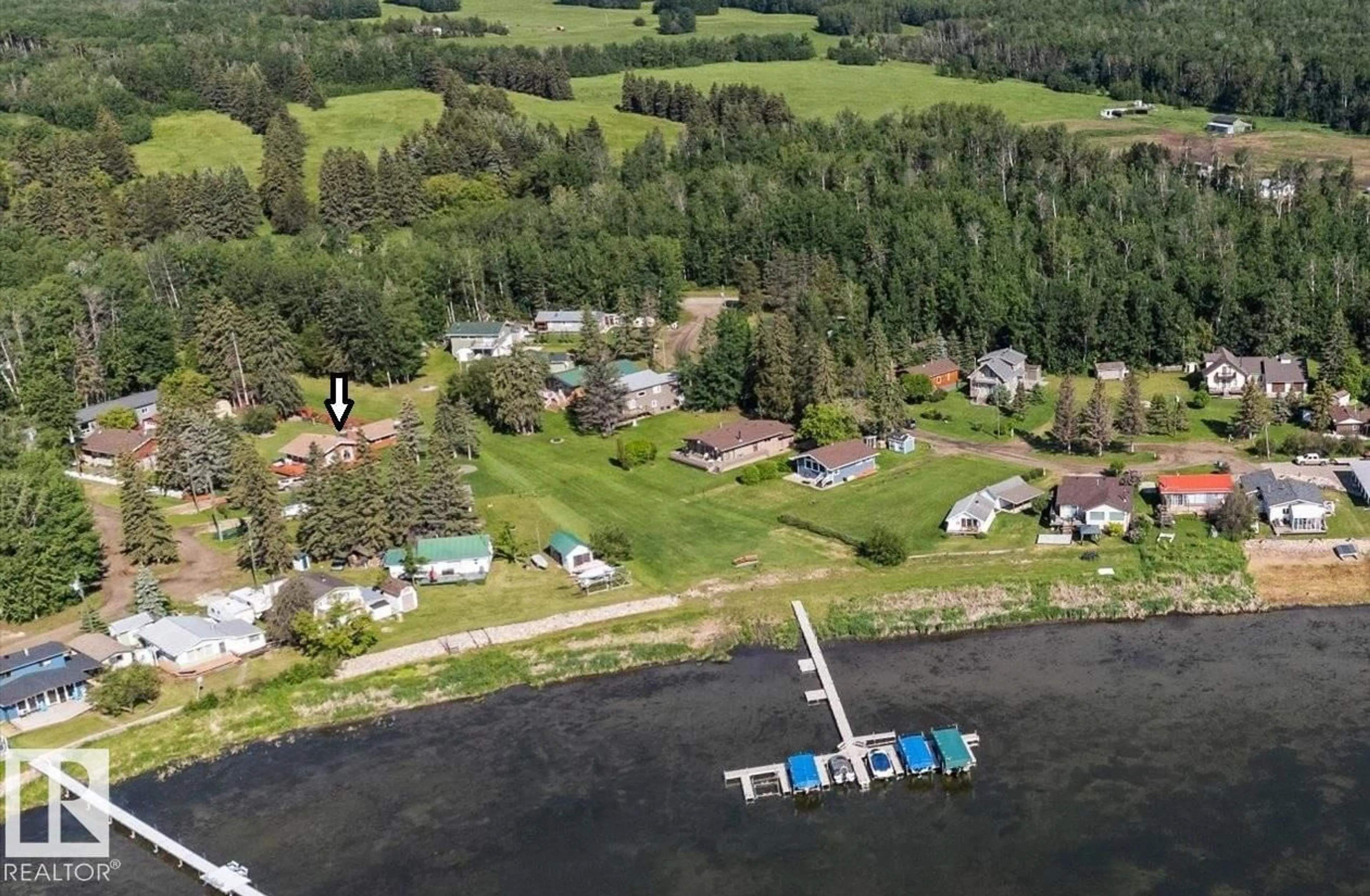 A pic from outside/outdoor area/front of a property/back of a property/a pic from drone, water/lake/river/ocean view for 309 - 308 3 ST, Rural Lac Ste. Anne County Alberta T0E1A0