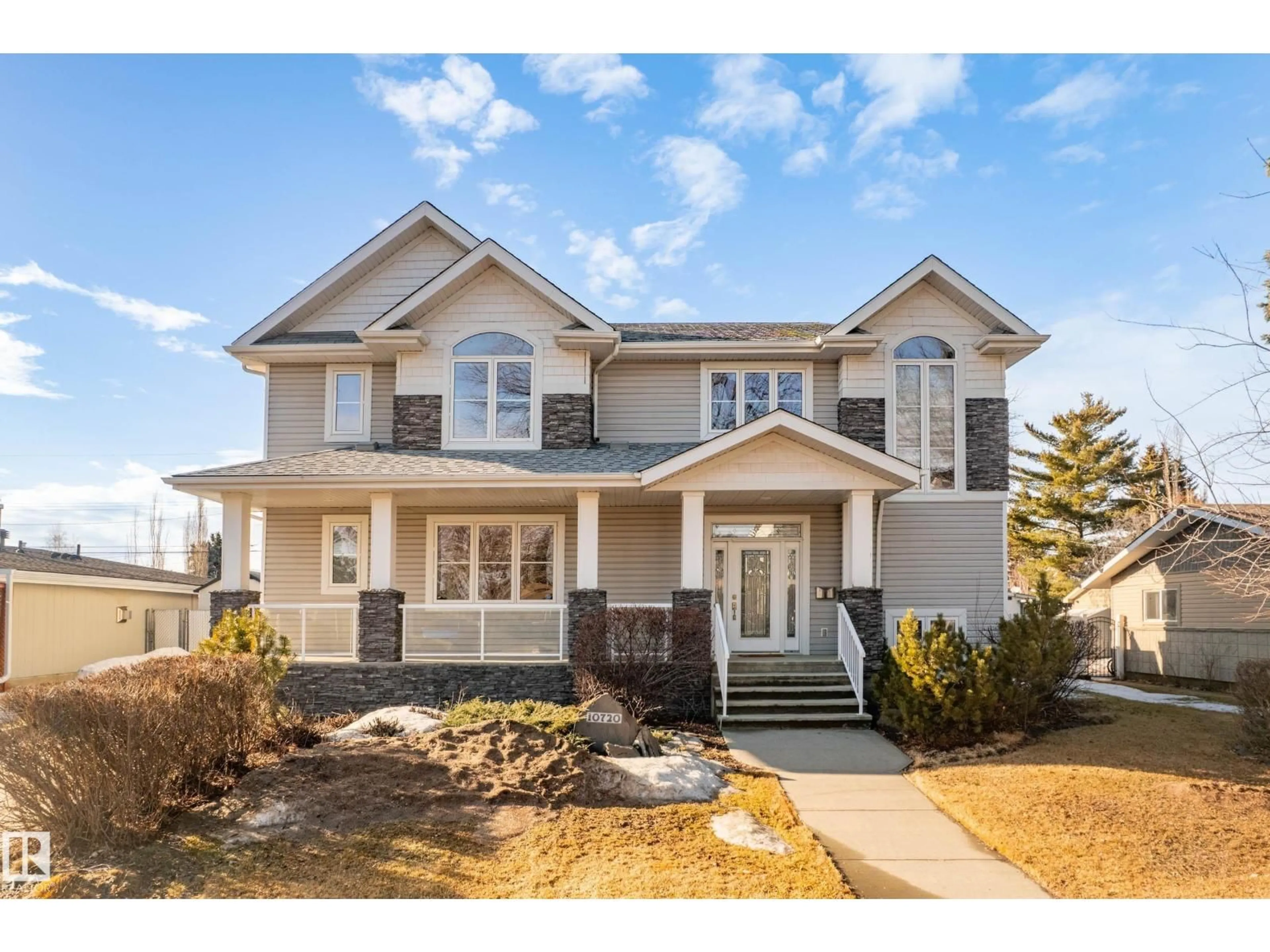 Home with vinyl exterior material, street for NW - 10720 65 ST, Edmonton Alberta T6A2P4