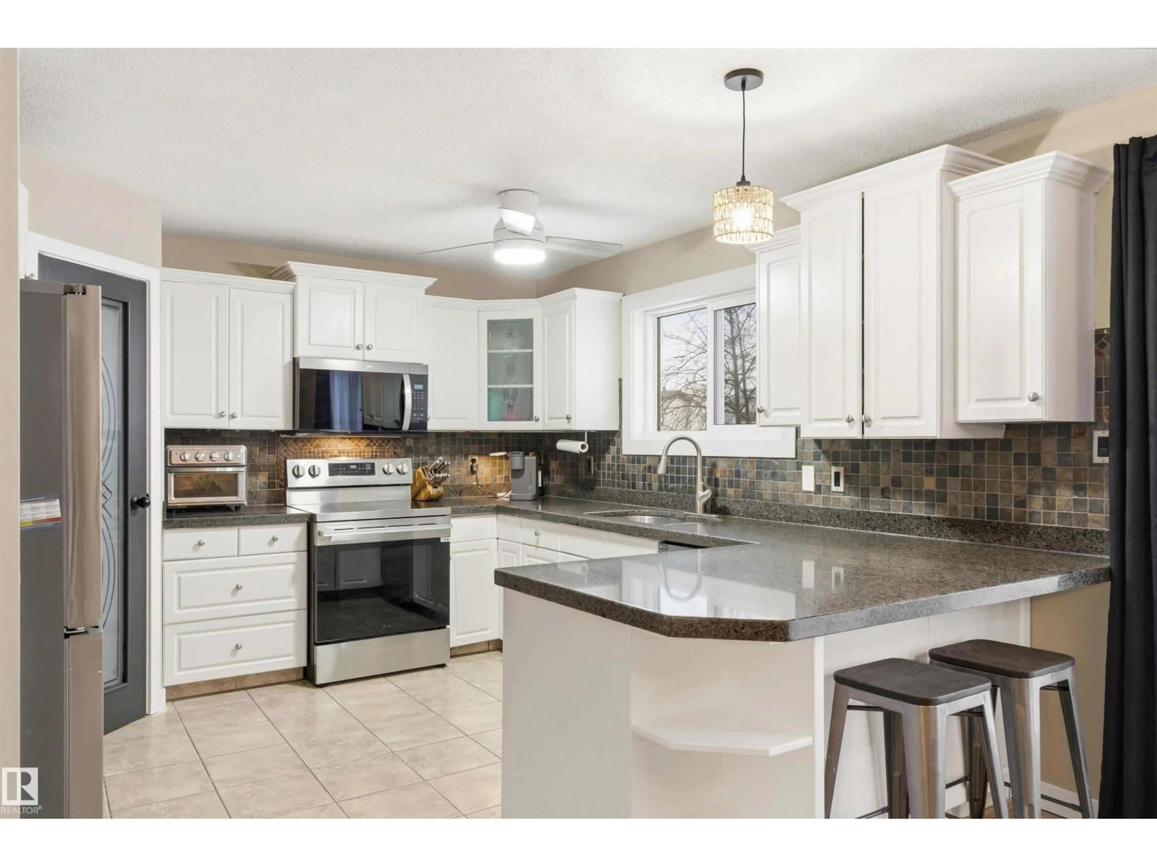 Open concept kitchen, ceramic/tile floor for 5203 41 ST, Cold Lake Alberta T9M2A4