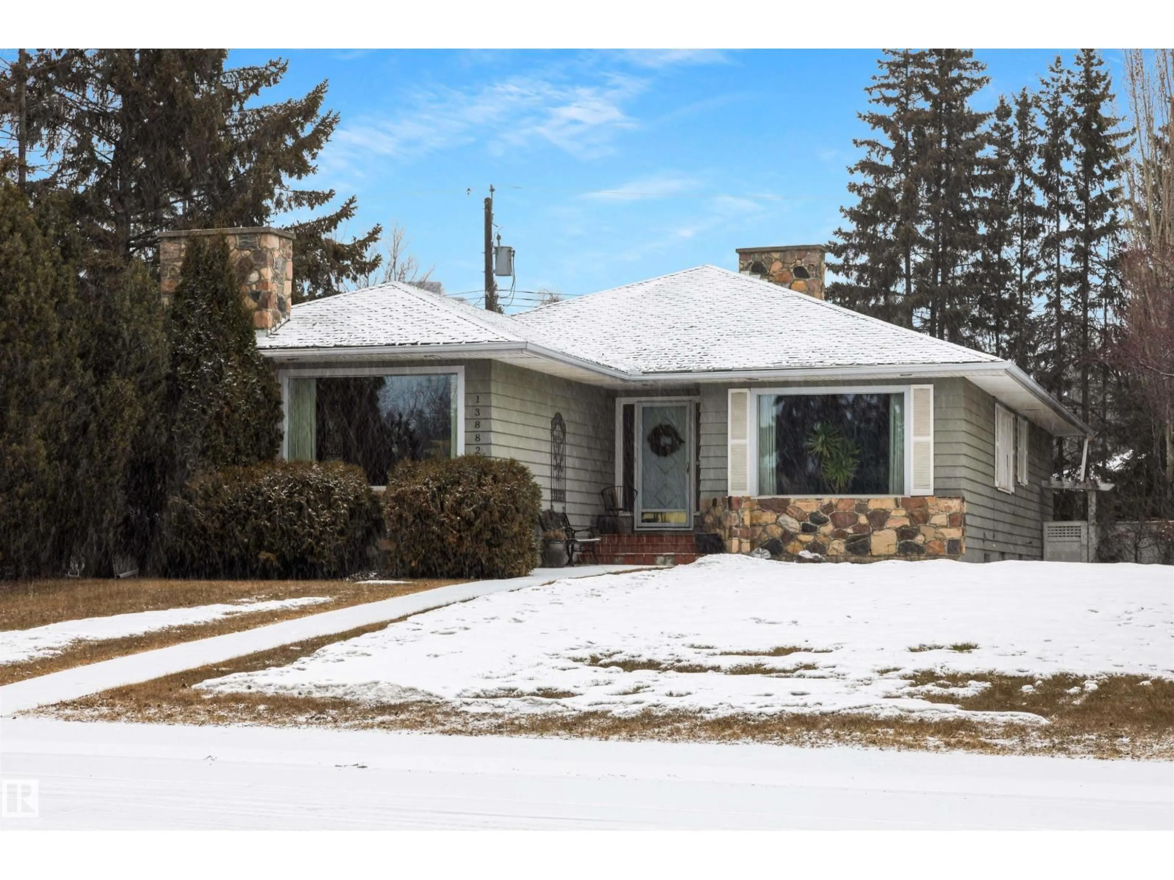 Home with vinyl exterior material, street for 13882 RAVINE DR, Edmonton Alberta T5N3M1