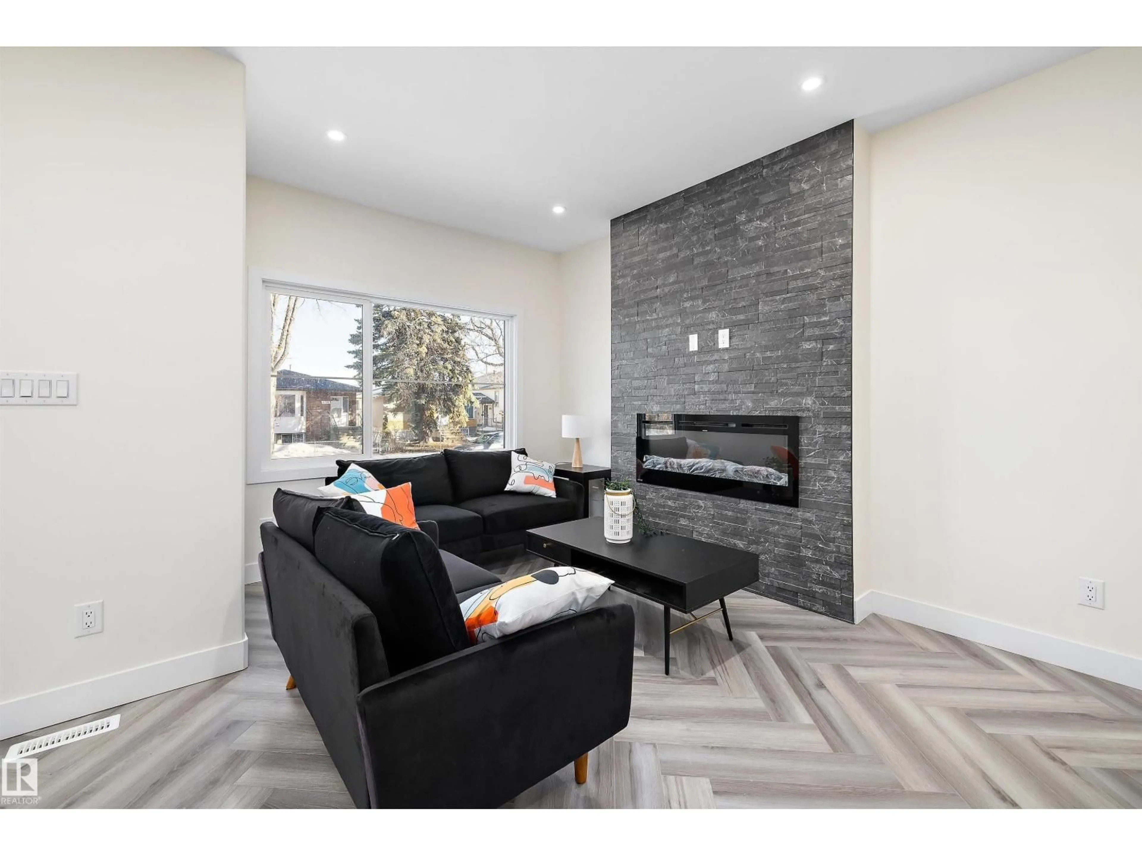 Living room with furniture, unknown for 8319 81 AVE, Edmonton Alberta T6C0W1