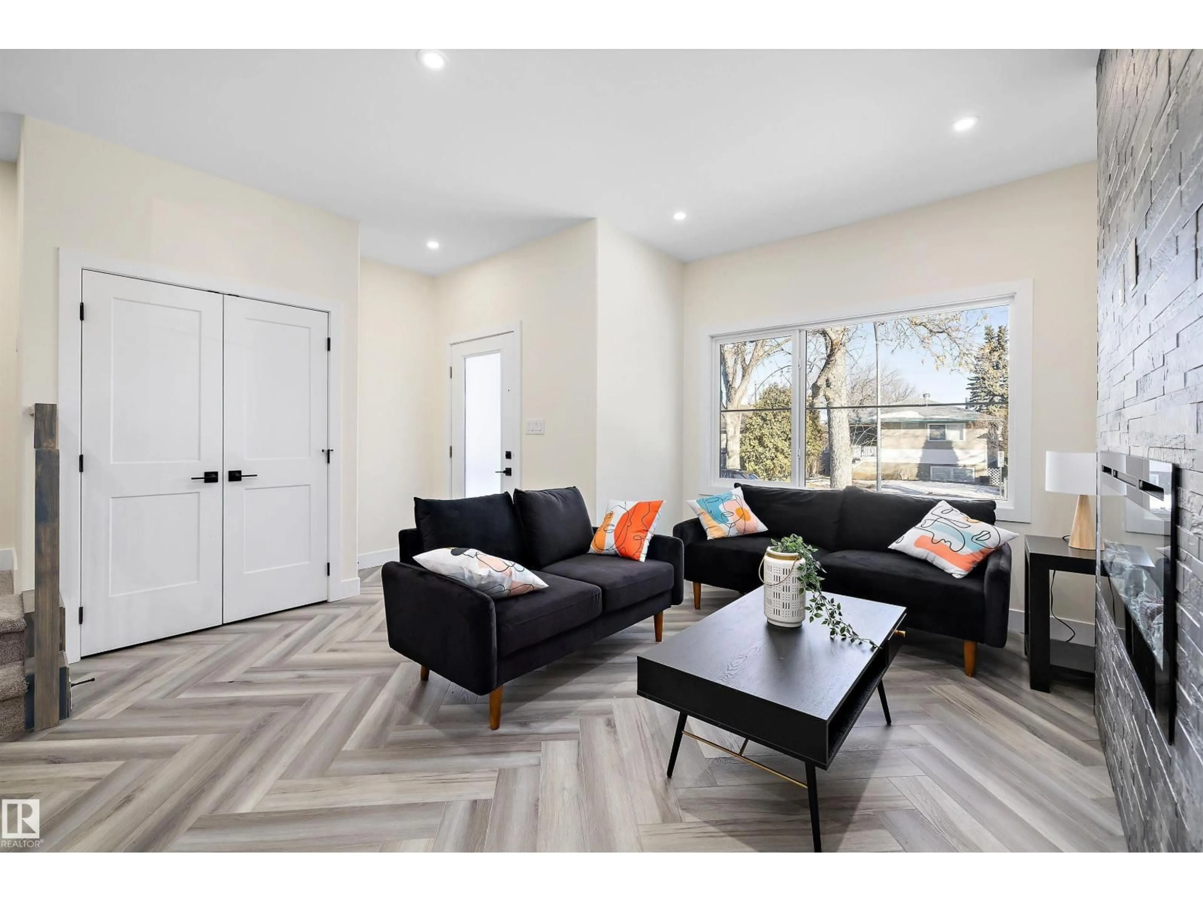 Living room with furniture, unknown for 8319 81 AVE, Edmonton Alberta T6C0W1