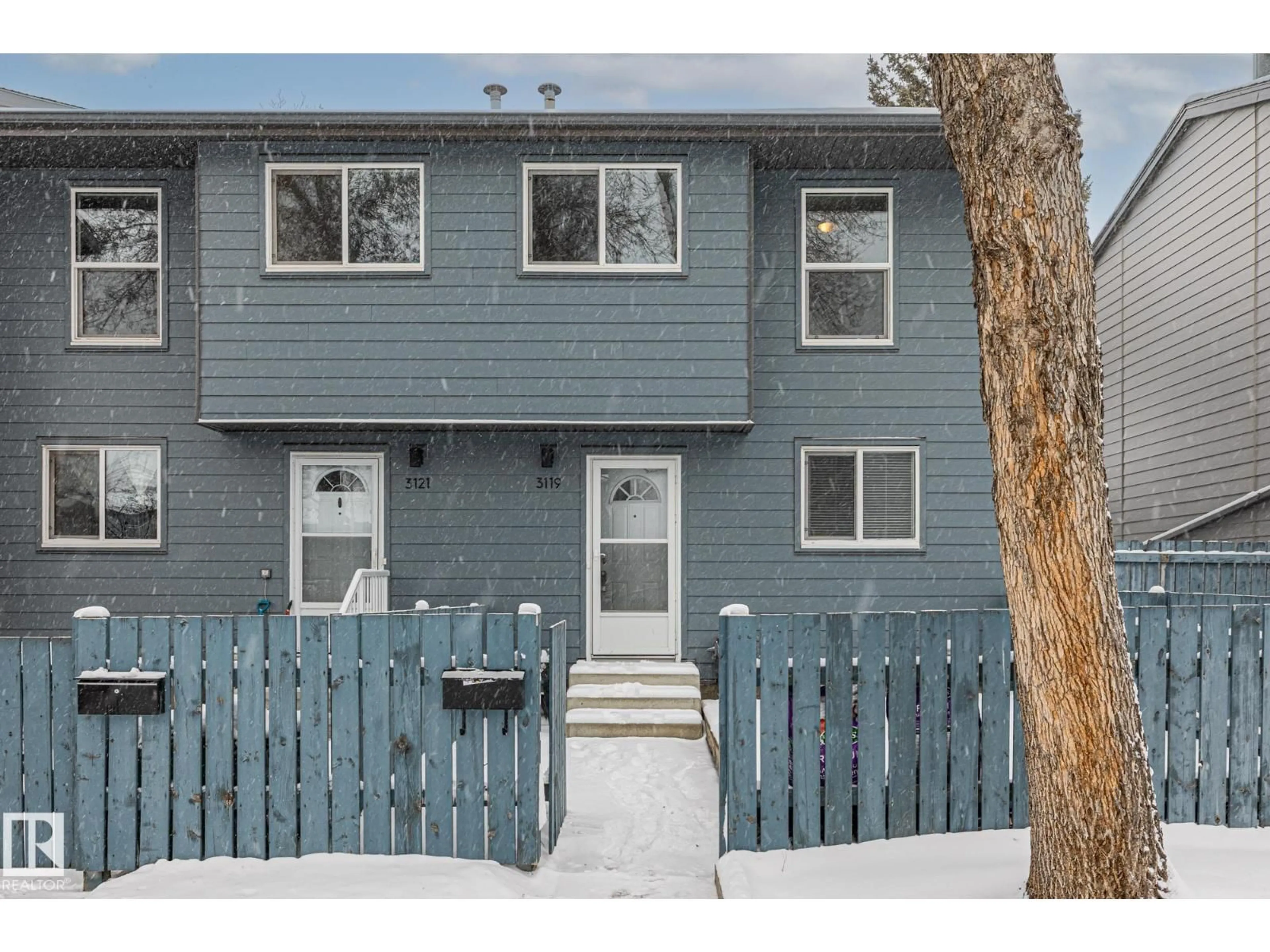 Home with vinyl exterior material, street for 3119 144 AV, Edmonton Alberta T5Y1H4