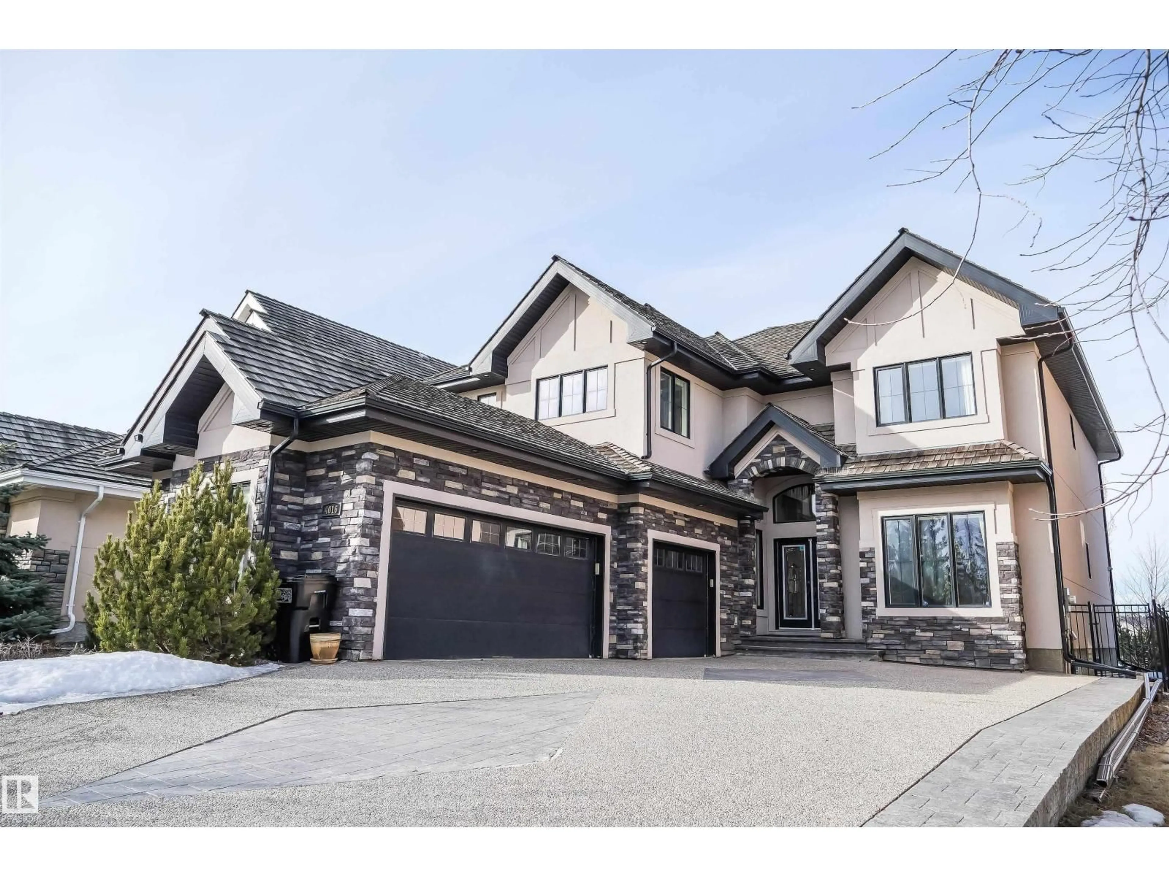 Home with brick exterior material, street for 4016 MACTAGGART DR, Edmonton Alberta T6R0J3