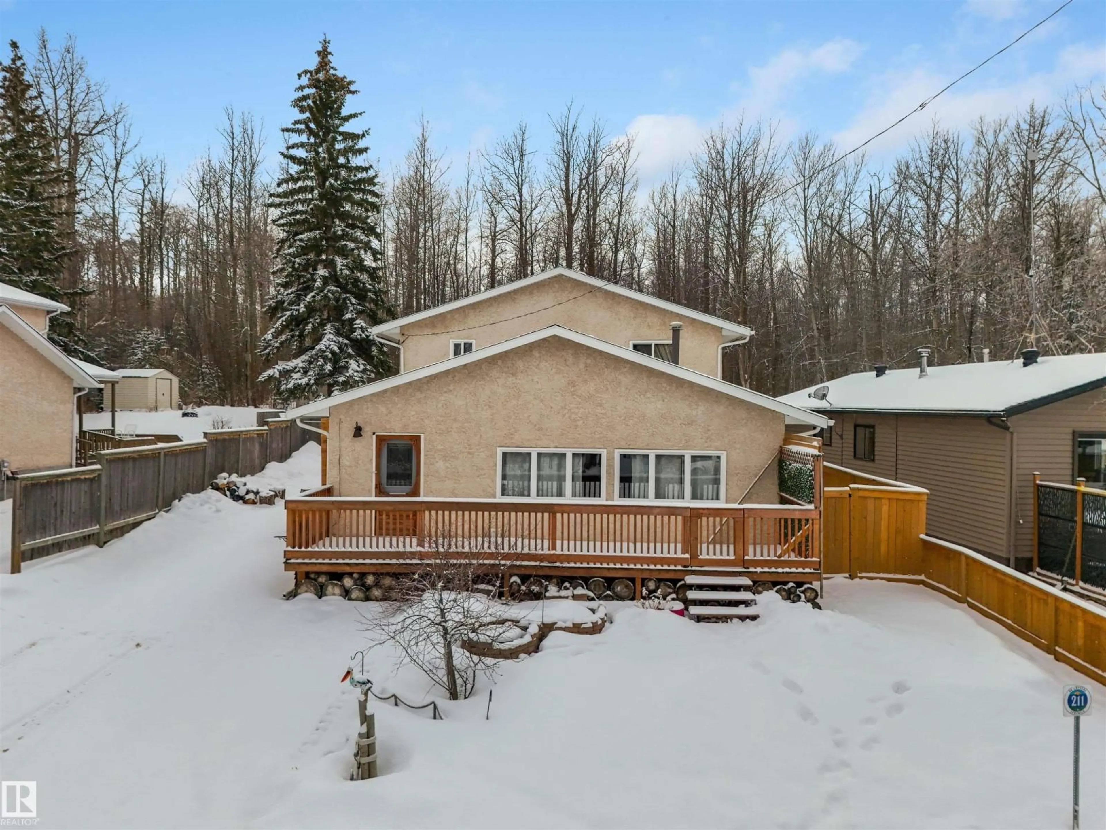 A pic from outside/outdoor area/front of a property/back of a property/a pic from drone, mountain view for 211 CRYSTAL SPRINGS DR, Rural Wetaskiwin County Alberta T0C2V0