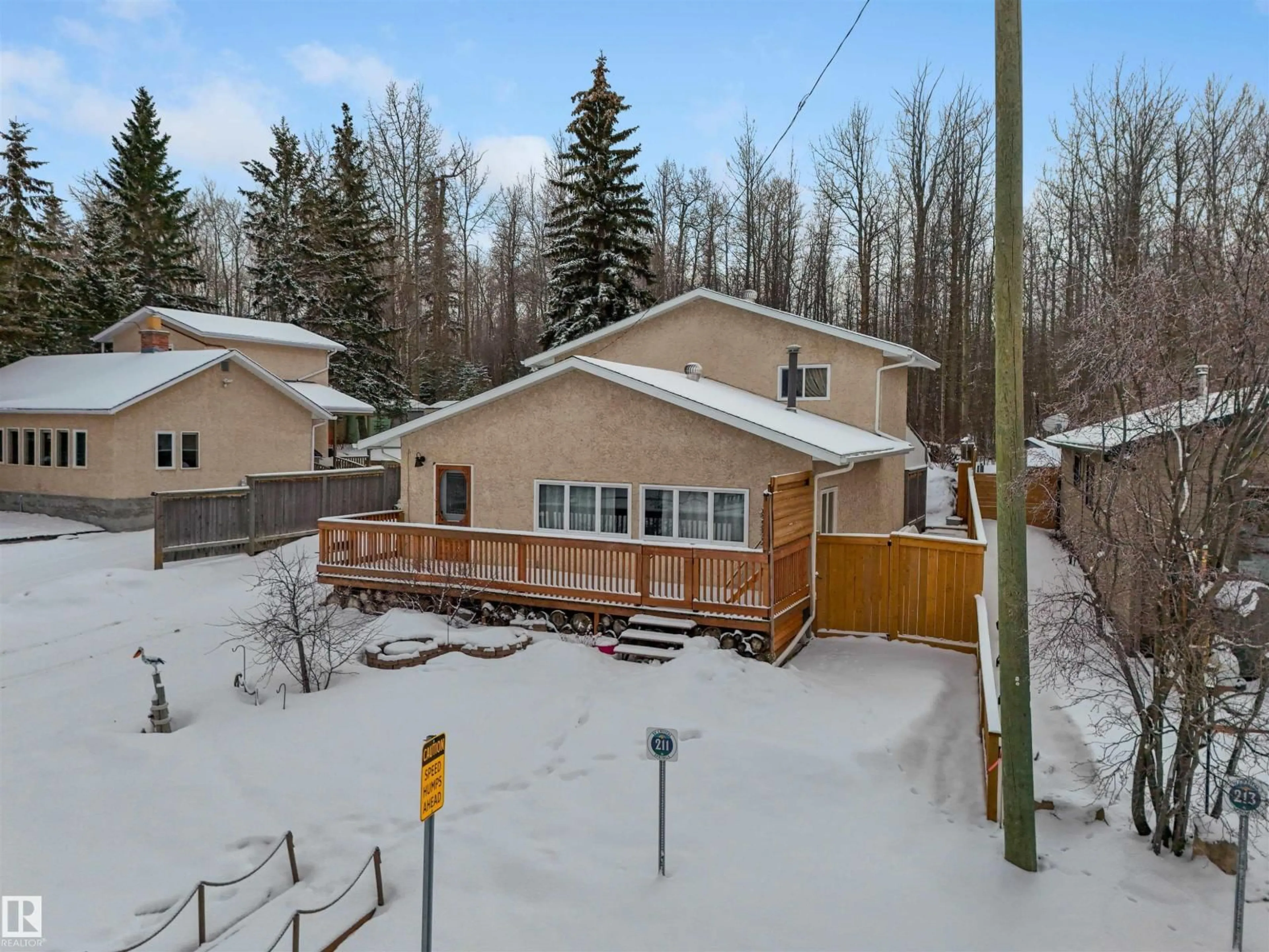A pic from outside/outdoor area/front of a property/back of a property/a pic from drone, street for 211 CRYSTAL SPRINGS DR, Rural Wetaskiwin County Alberta T0C2V0
