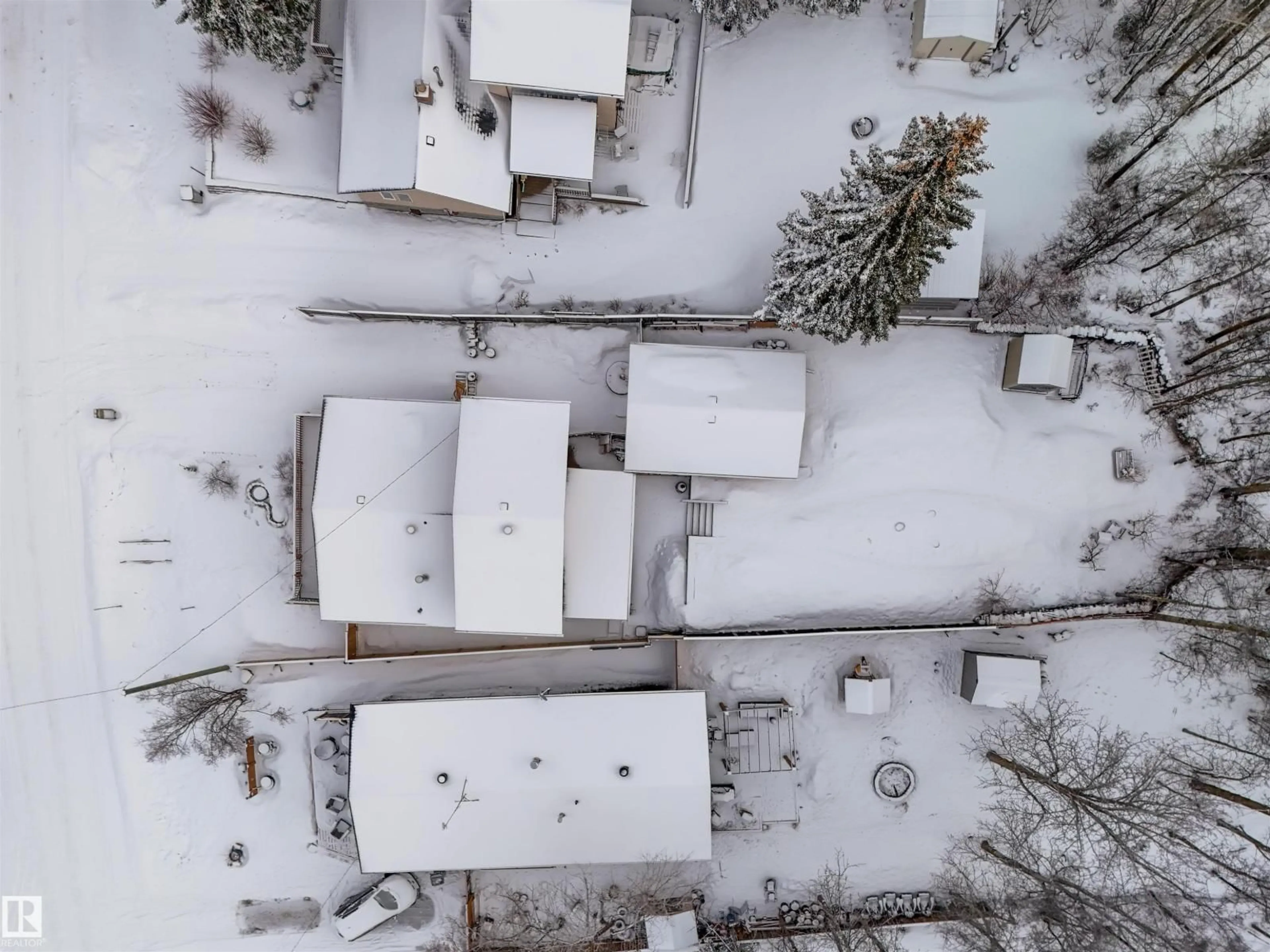 A pic from outside/outdoor area/front of a property/back of a property/a pic from drone, street for 211 CRYSTAL SPRINGS DR, Rural Wetaskiwin County Alberta T0C2V0