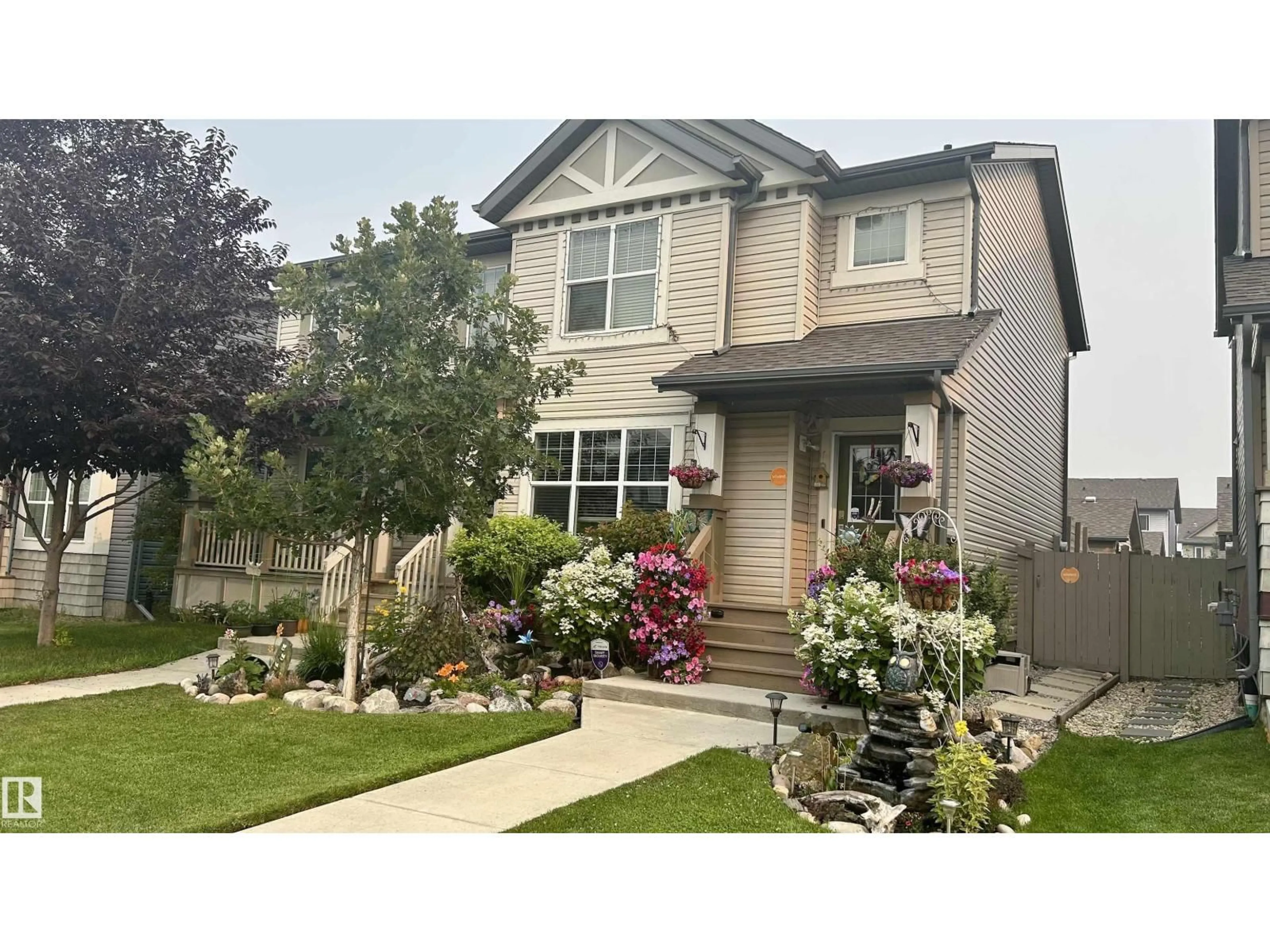 Home with vinyl exterior material, street for 2914 18A AV, Edmonton Alberta T6T0N7