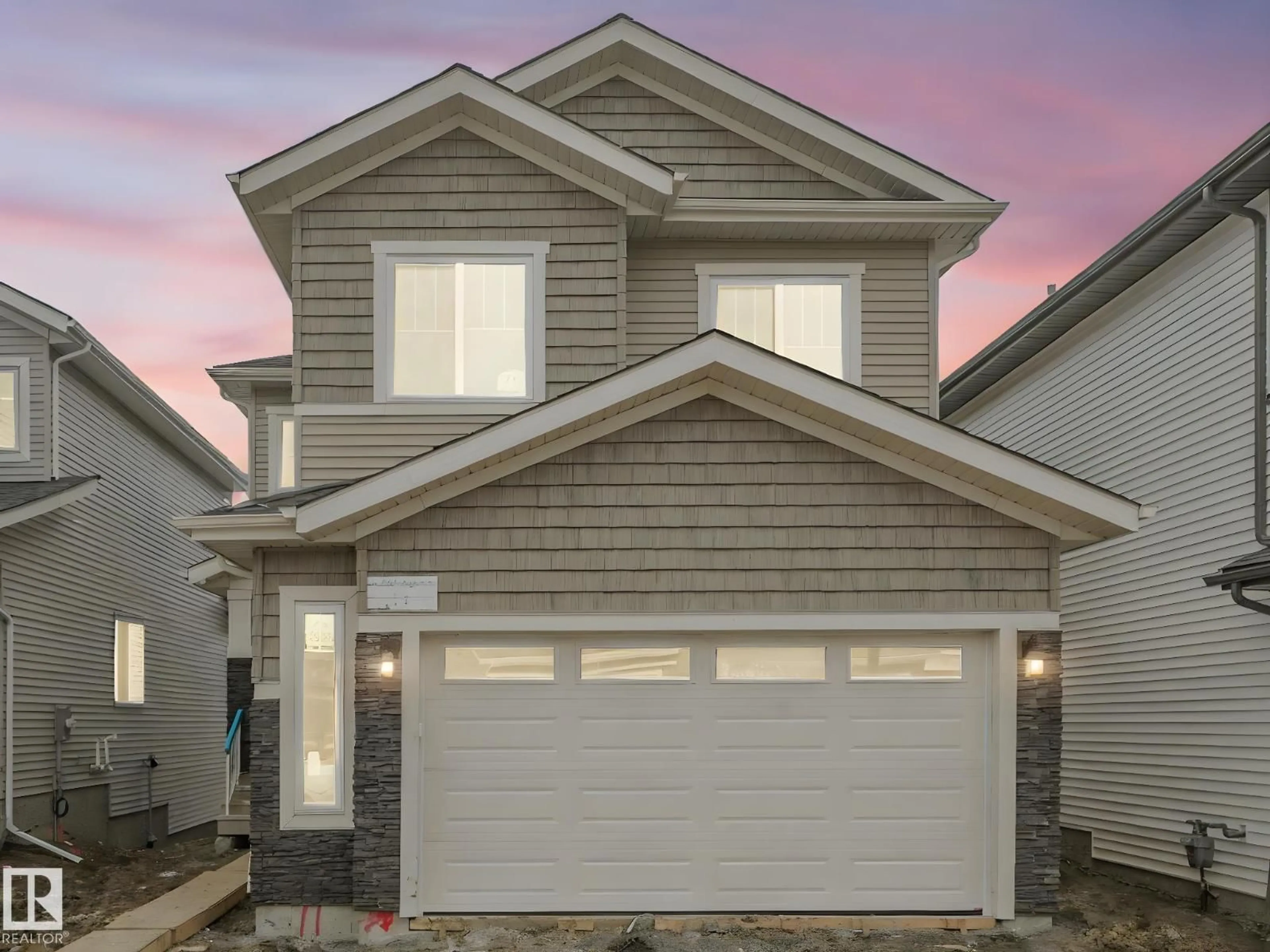 Home with vinyl exterior material, street for 71 MEADOWGROVE LN, Spruce Grove Alberta T7X0W2