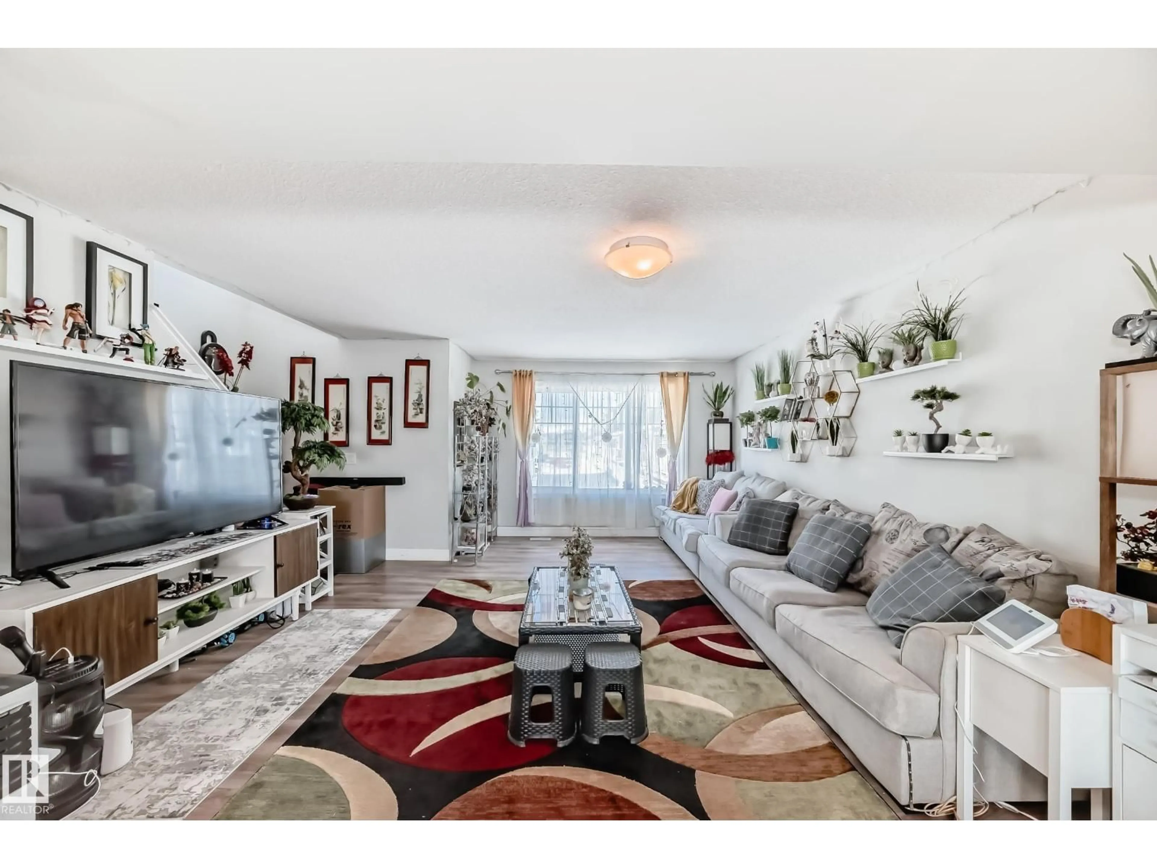 Living room with furniture, unknown for 35 - 1391 STARLING DR, Edmonton Alberta T5S0L3