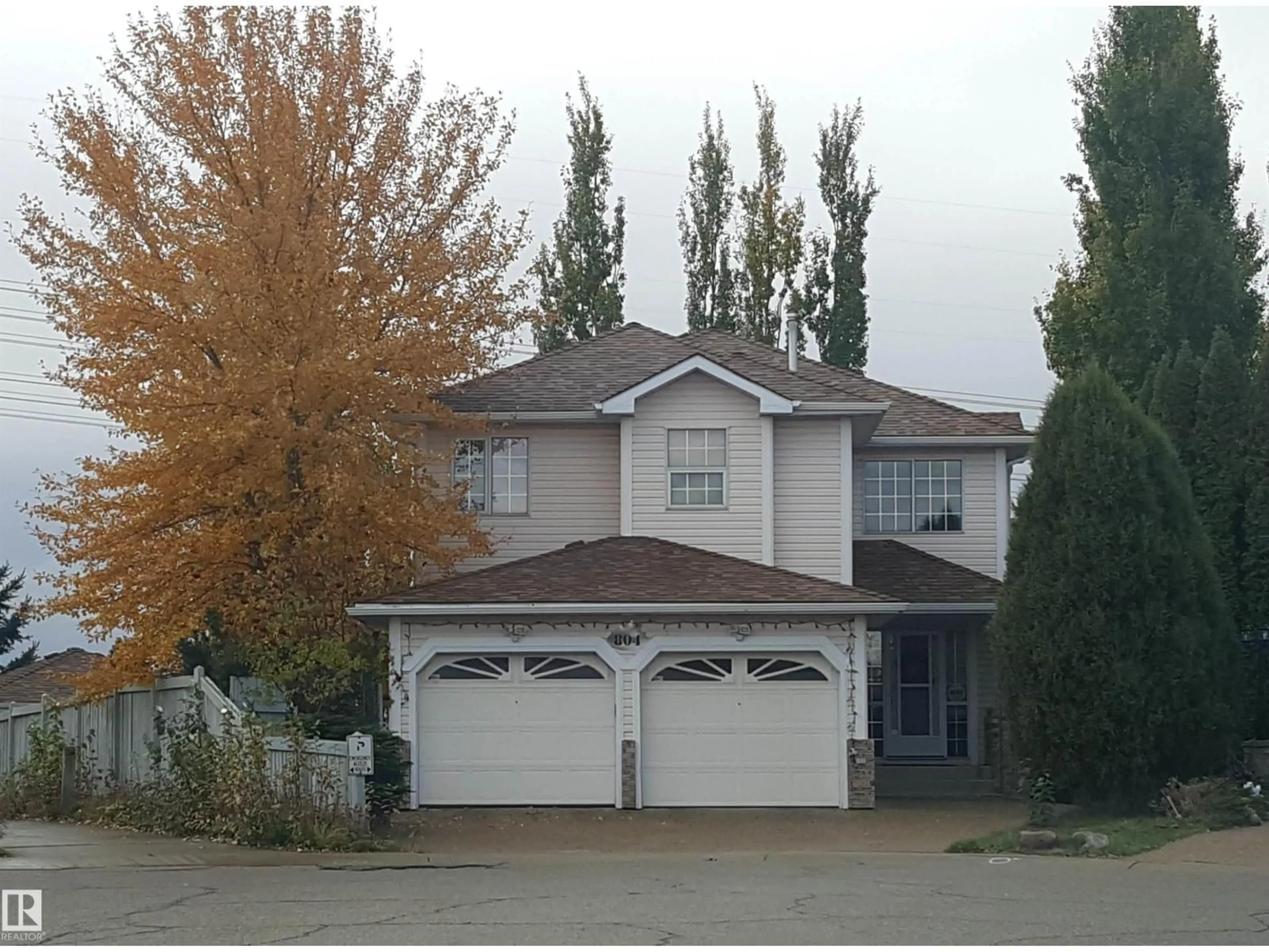 Home with vinyl exterior material, street for NW - 804 115A ST, Edmonton Alberta T6J6T9