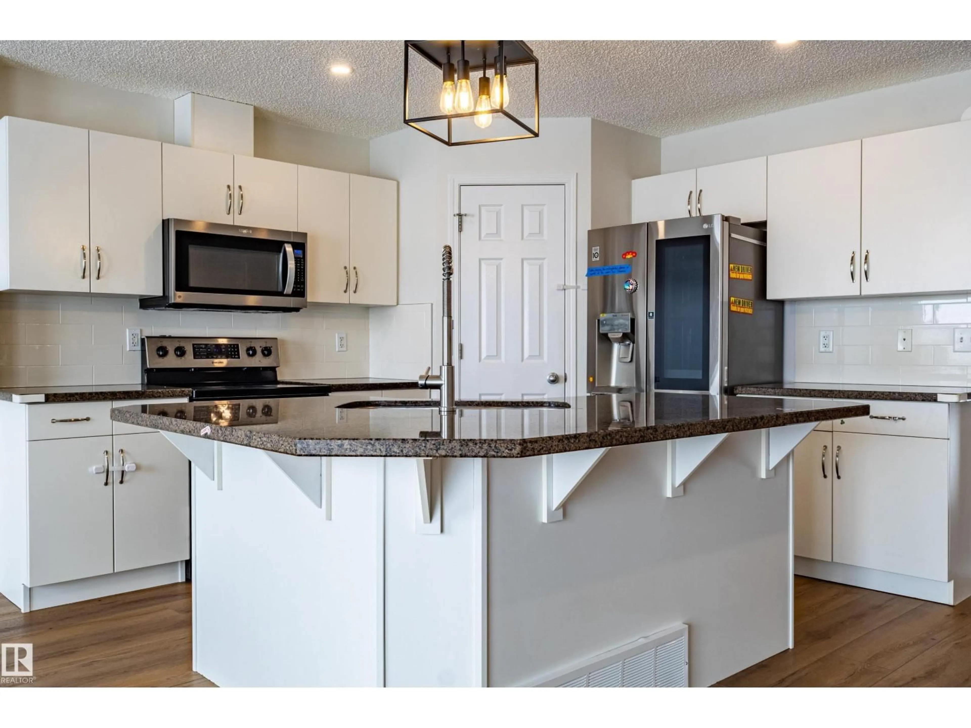 Open concept kitchen, unknown for 21326 61 AV, Edmonton Alberta T6M0K1