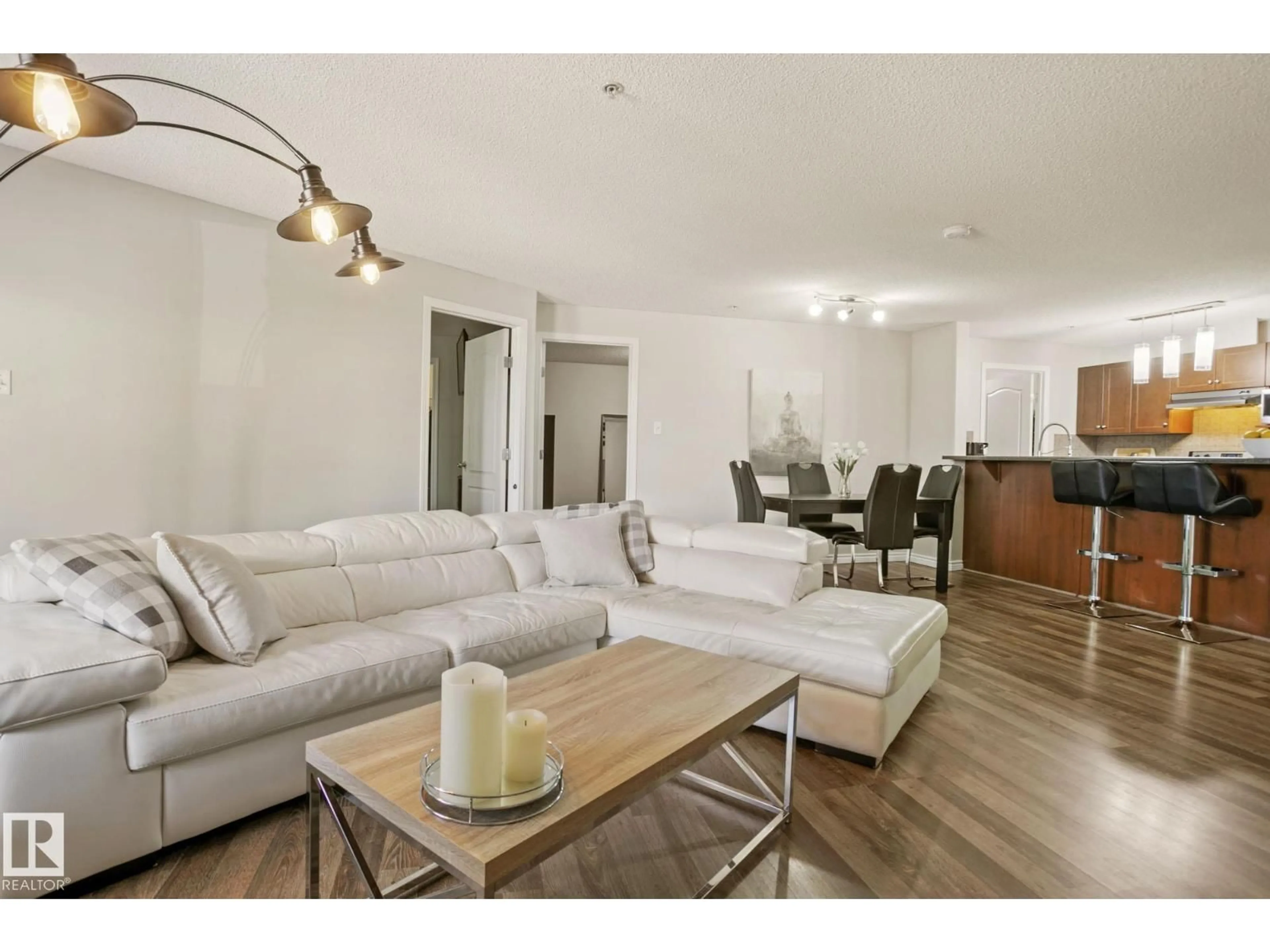 Living room with furniture, wood/laminate floor for 9363 SIMPSON DR, Edmonton Alberta T6R0N2