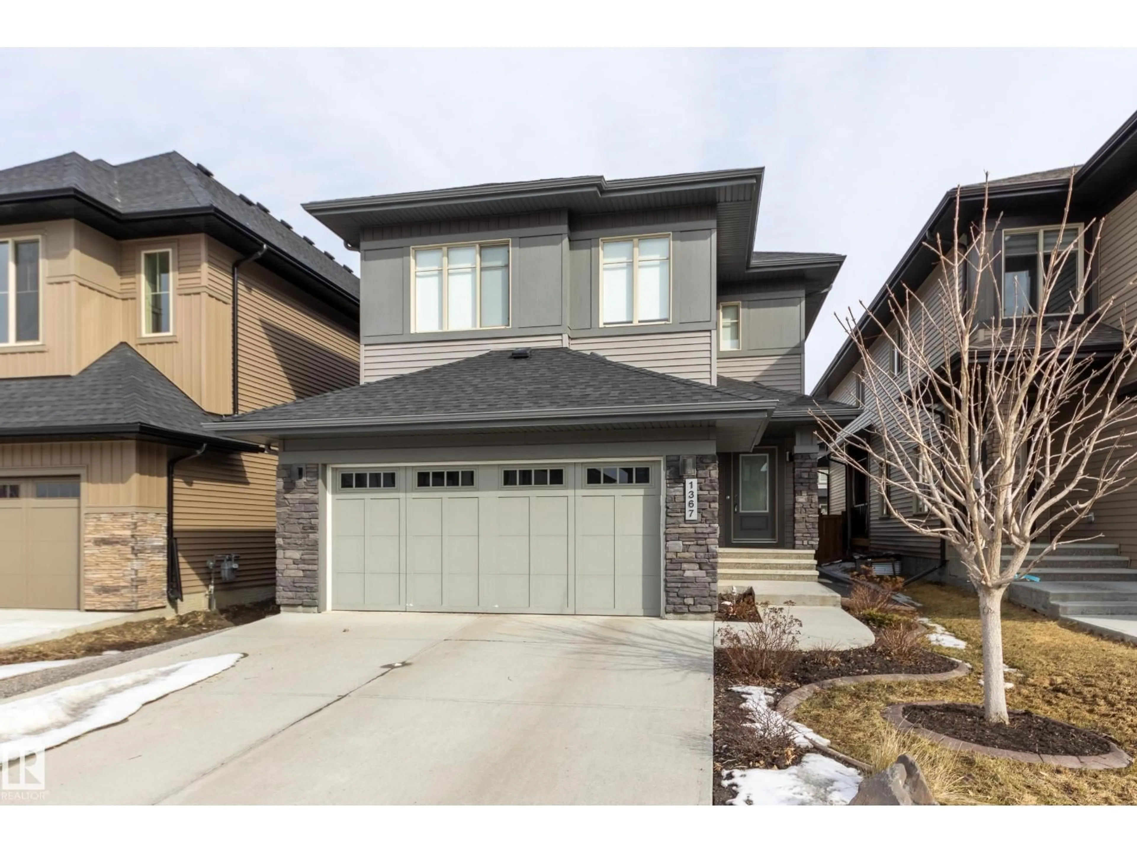 Home with brick exterior material, street for 1367 AINSLIE WD, Edmonton Alberta T6W3E9