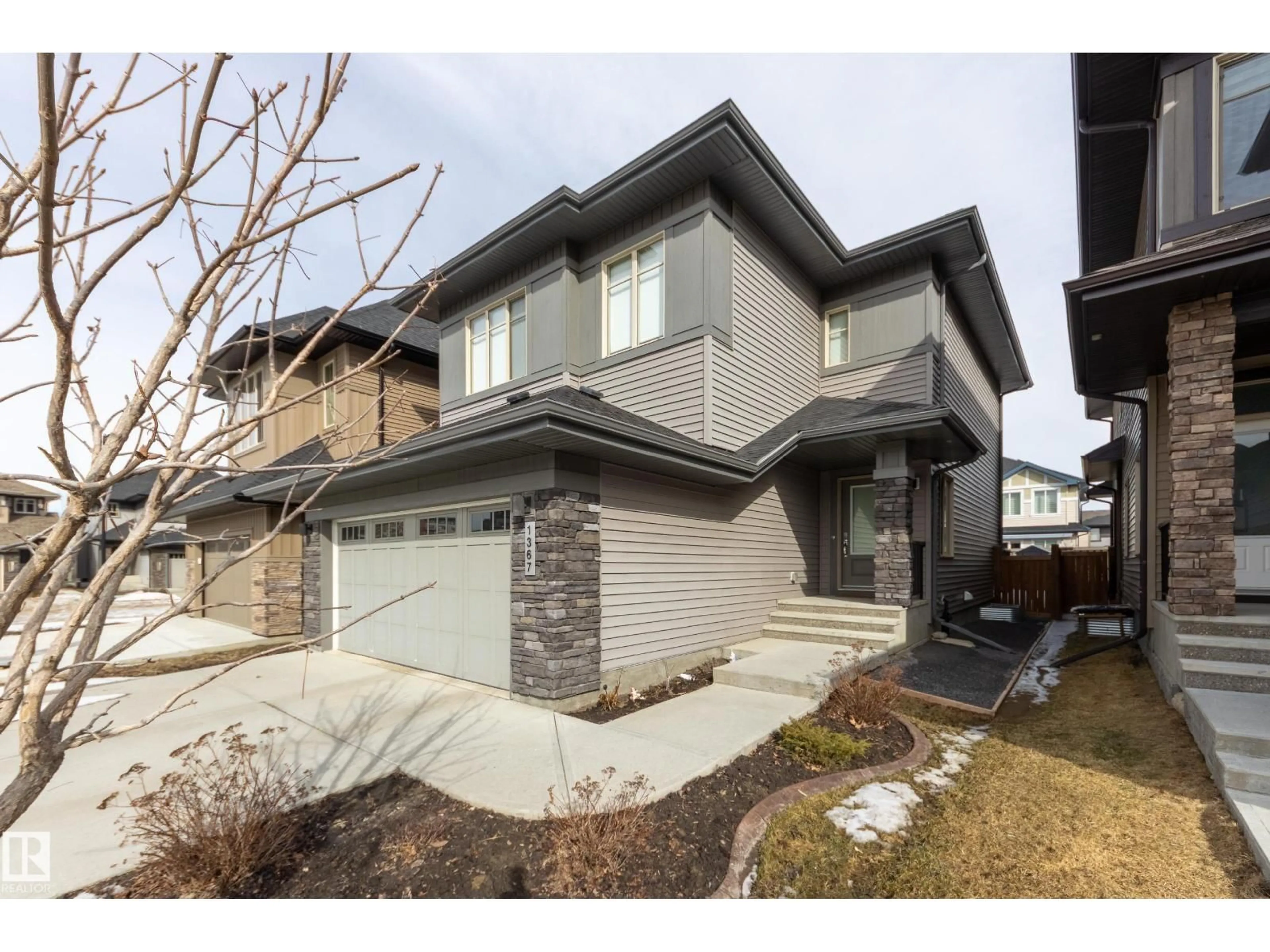 Home with brick exterior material, street for 1367 AINSLIE WD, Edmonton Alberta T6W3E9