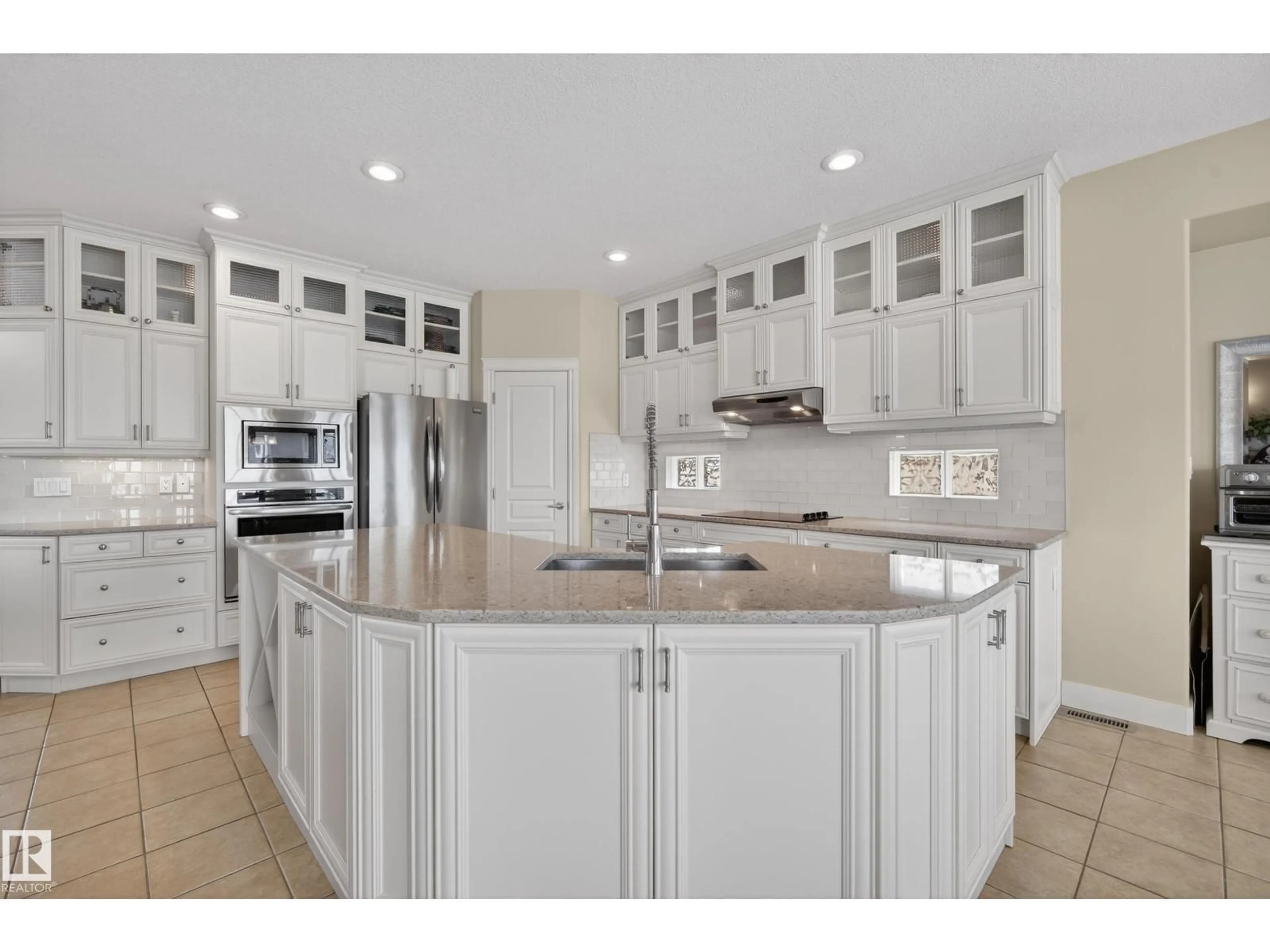 Open concept kitchen, ceramic/tile floor for NW - 15712 135 ST, Edmonton Alberta T6V1P6