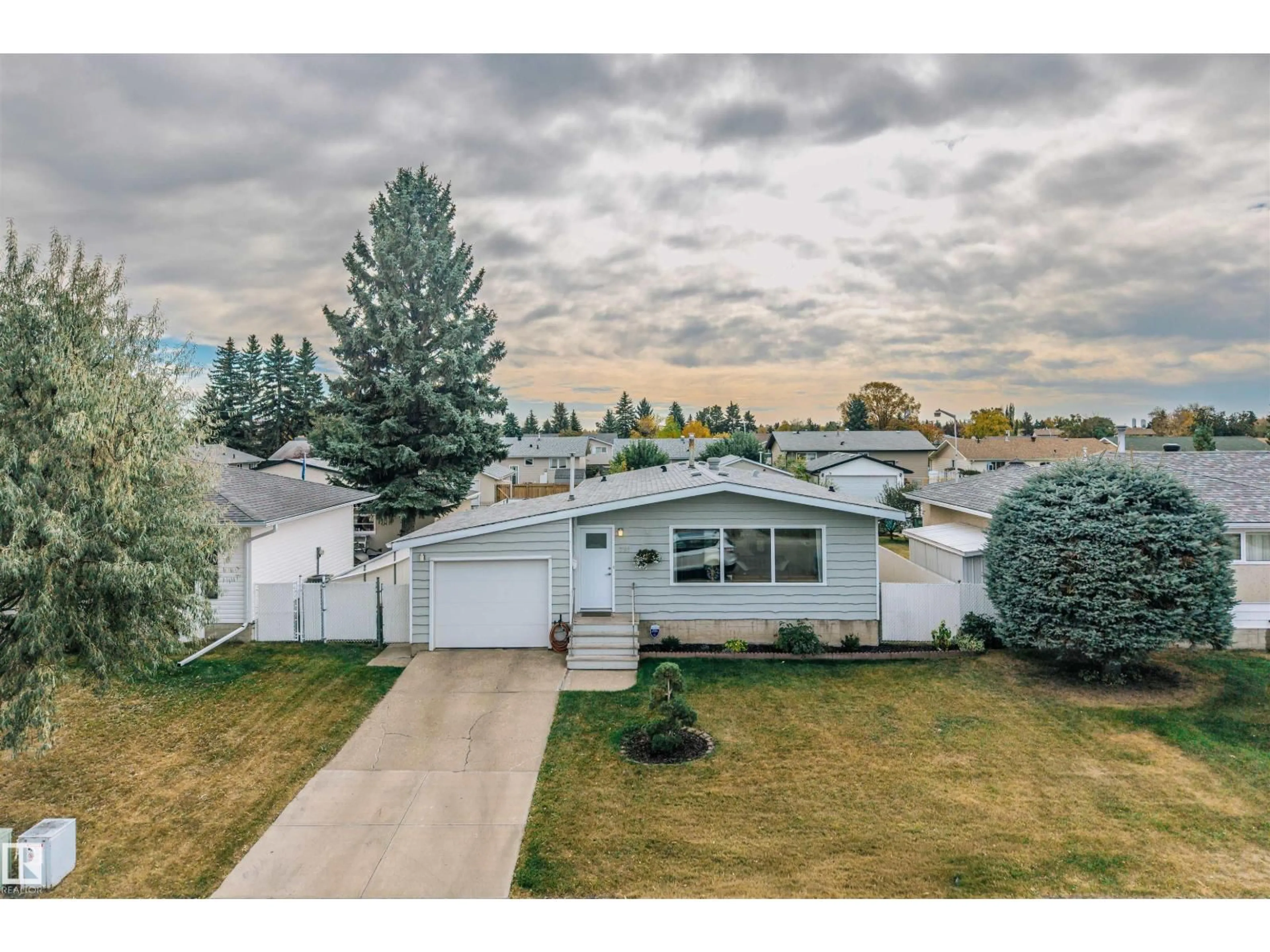 A pic from outside/outdoor area/front of a property/back of a property/a pic from drone, street for 7811 148 AV, Edmonton Alberta T5C2T8