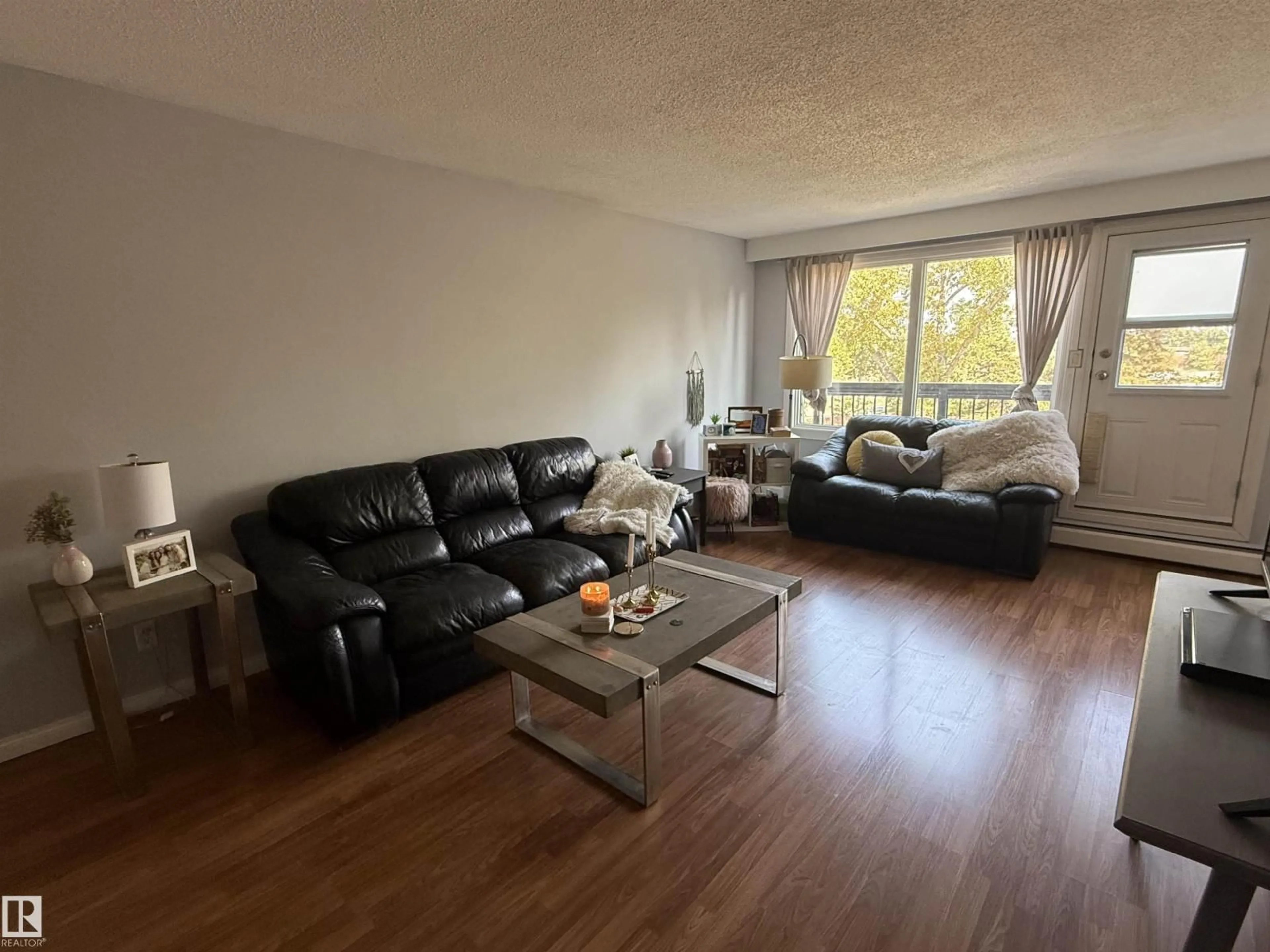 Living room with furniture, unknown for 207 - 7815 159 ST NW, Edmonton Alberta T5R2E1