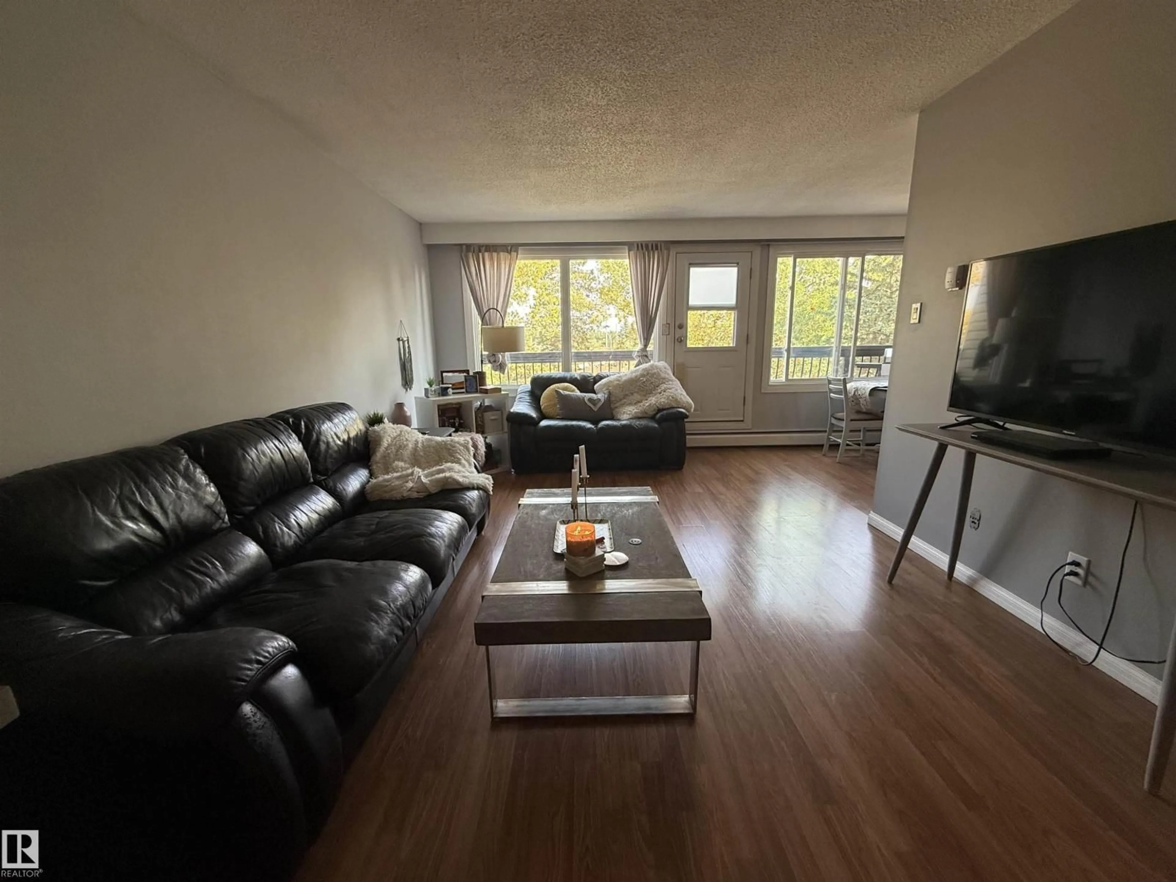 Living room with furniture, unknown for 207 - 7815 159 ST NW, Edmonton Alberta T5R2E1
