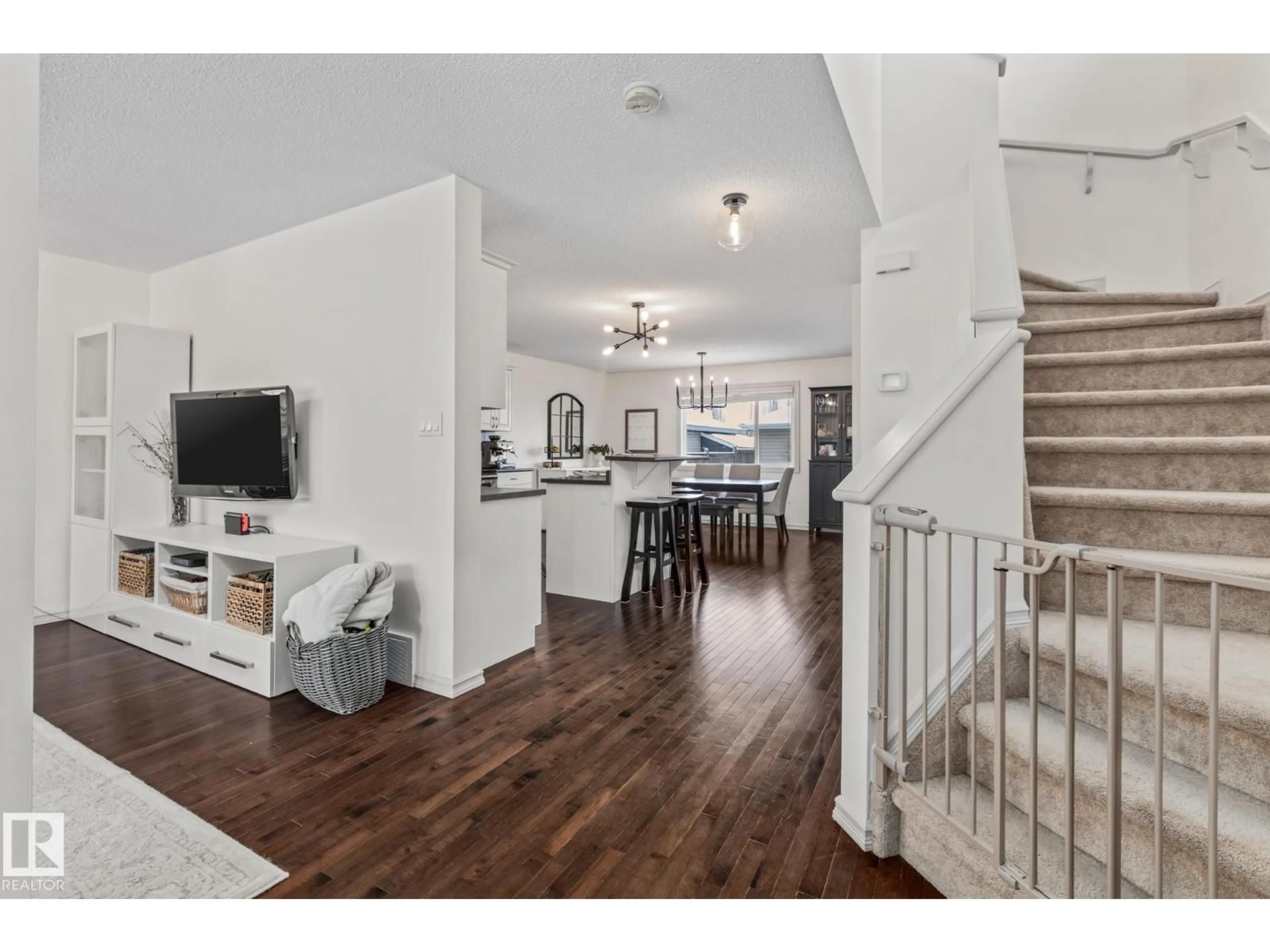 Open concept kitchen, wood/laminate floor for NW - 1133 35A AV, Edmonton Alberta T6T0J7