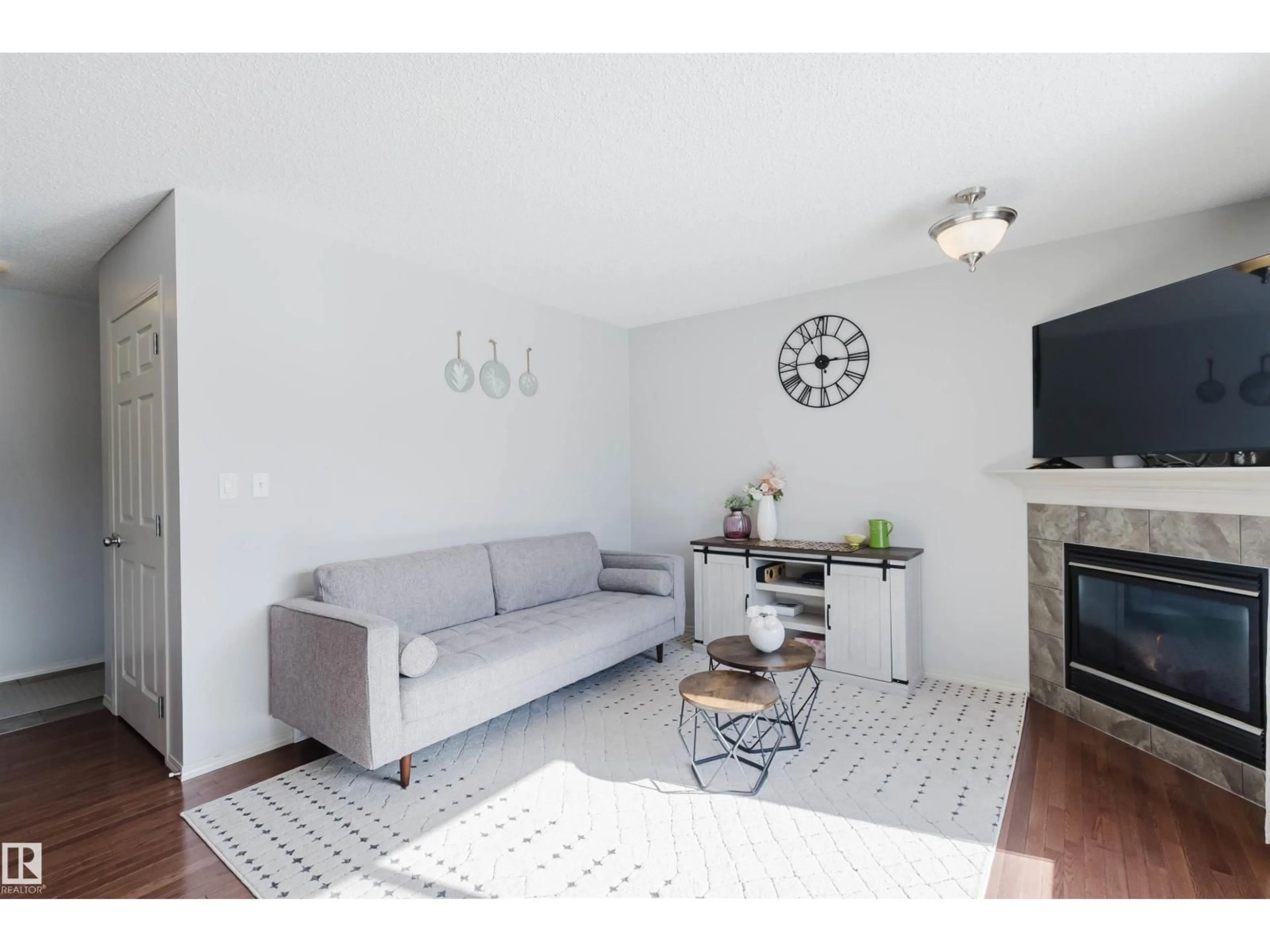 Living room with furniture, wood/laminate floor for 2349 LEMIEUX PL, Edmonton Alberta T6R0C3