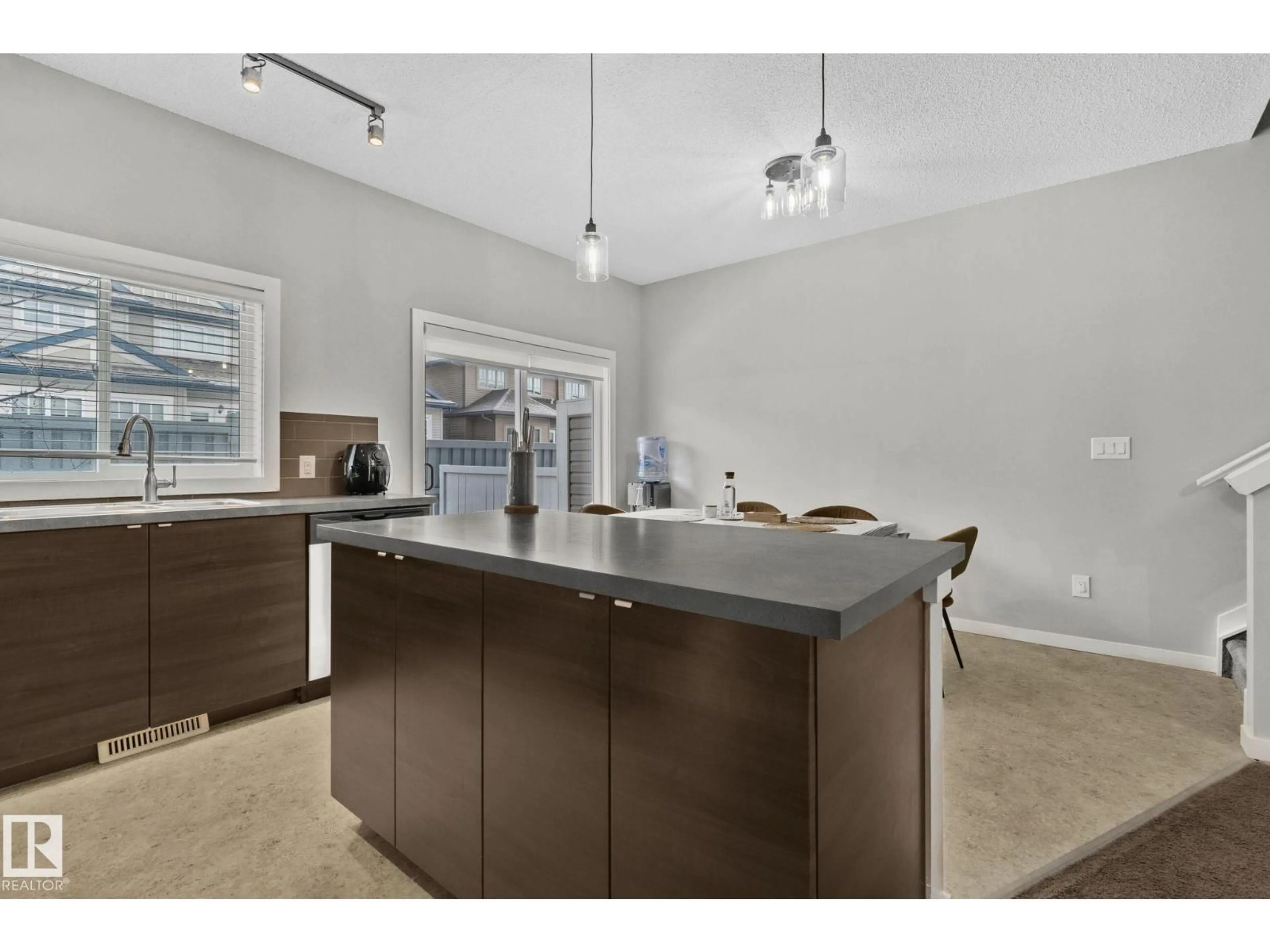 Open concept kitchen, unknown for #11 - 3710 ALLAN DR, Edmonton Alberta T6W2C4
