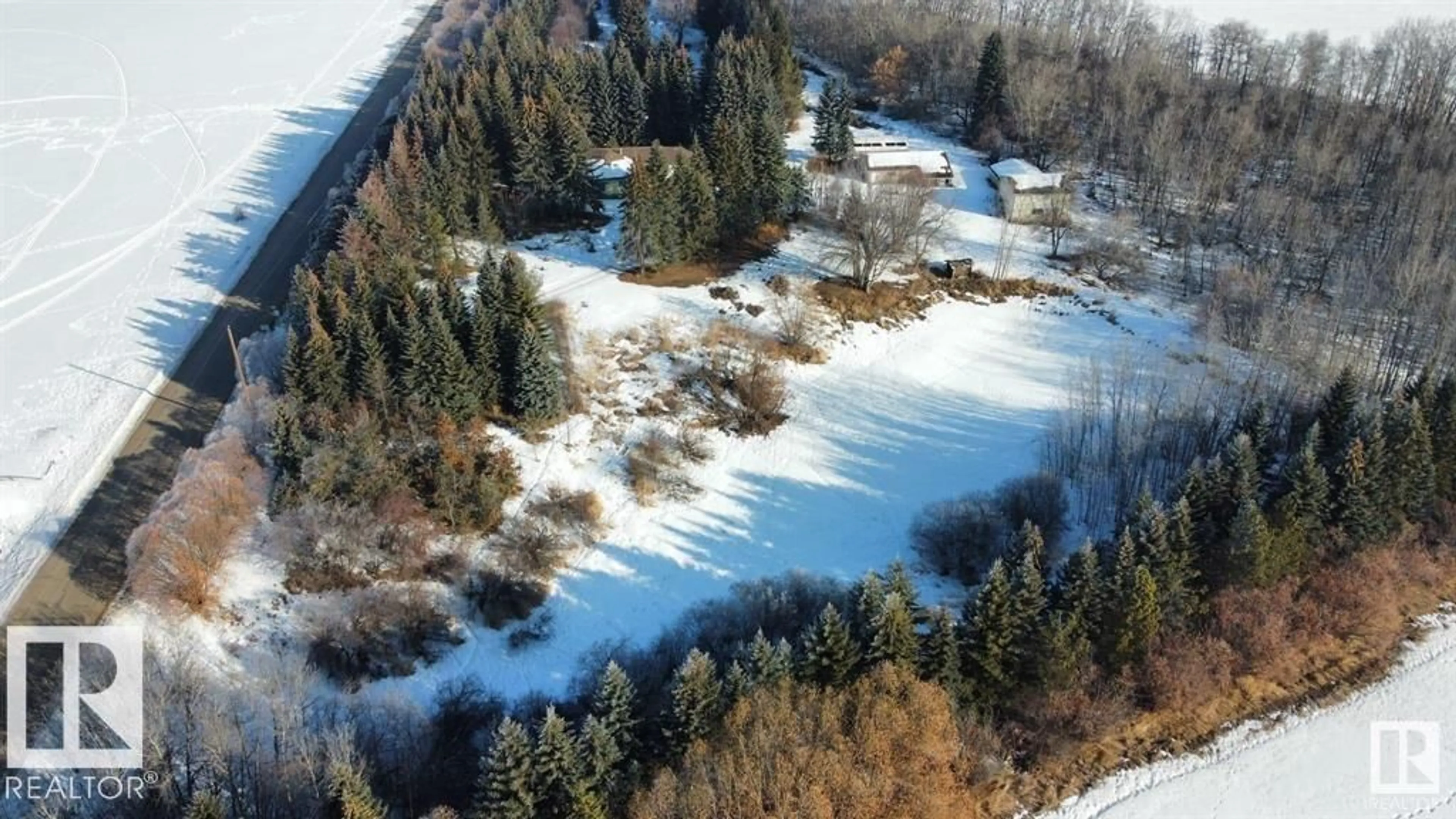 A pic from outside/outdoor area/front of a property/back of a property/a pic from drone, unknown for 54305 RR 253, St. Albert Alberta T8T0S6