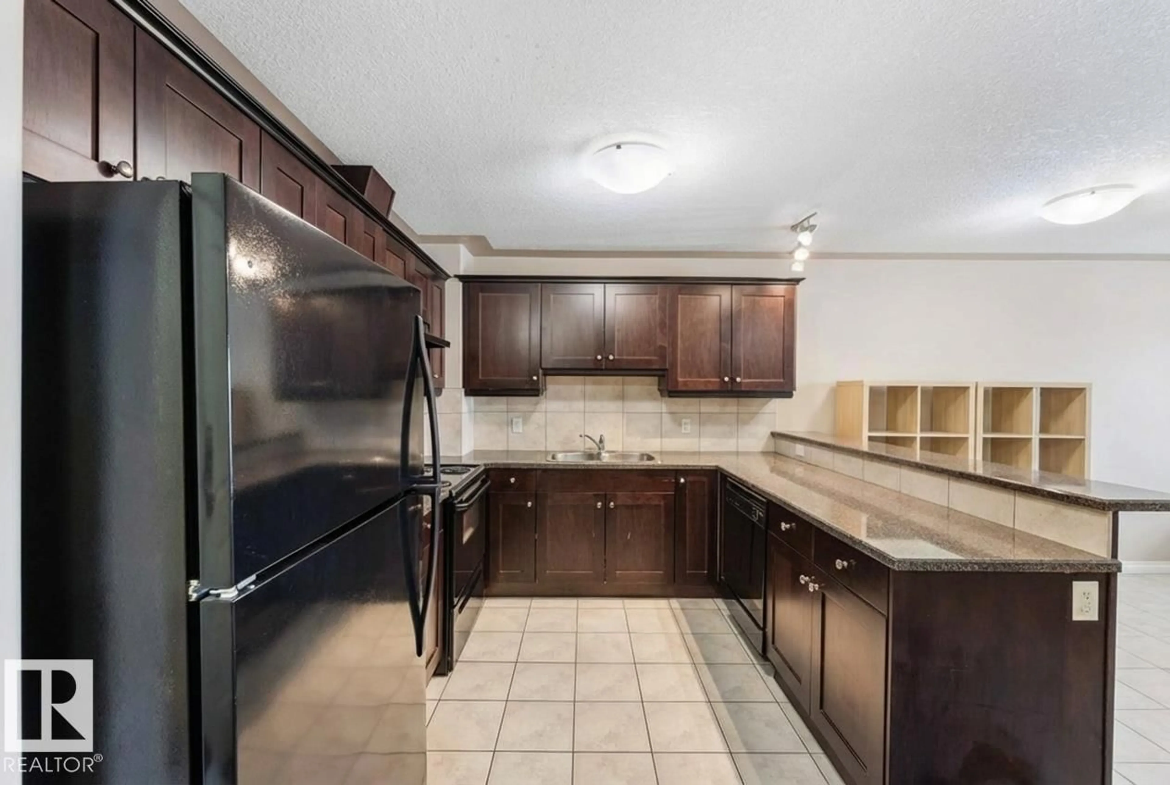 Standard kitchen, ceramic/tile floor for 408 - 4415 48 ST, Leduc Alberta T9E4C4