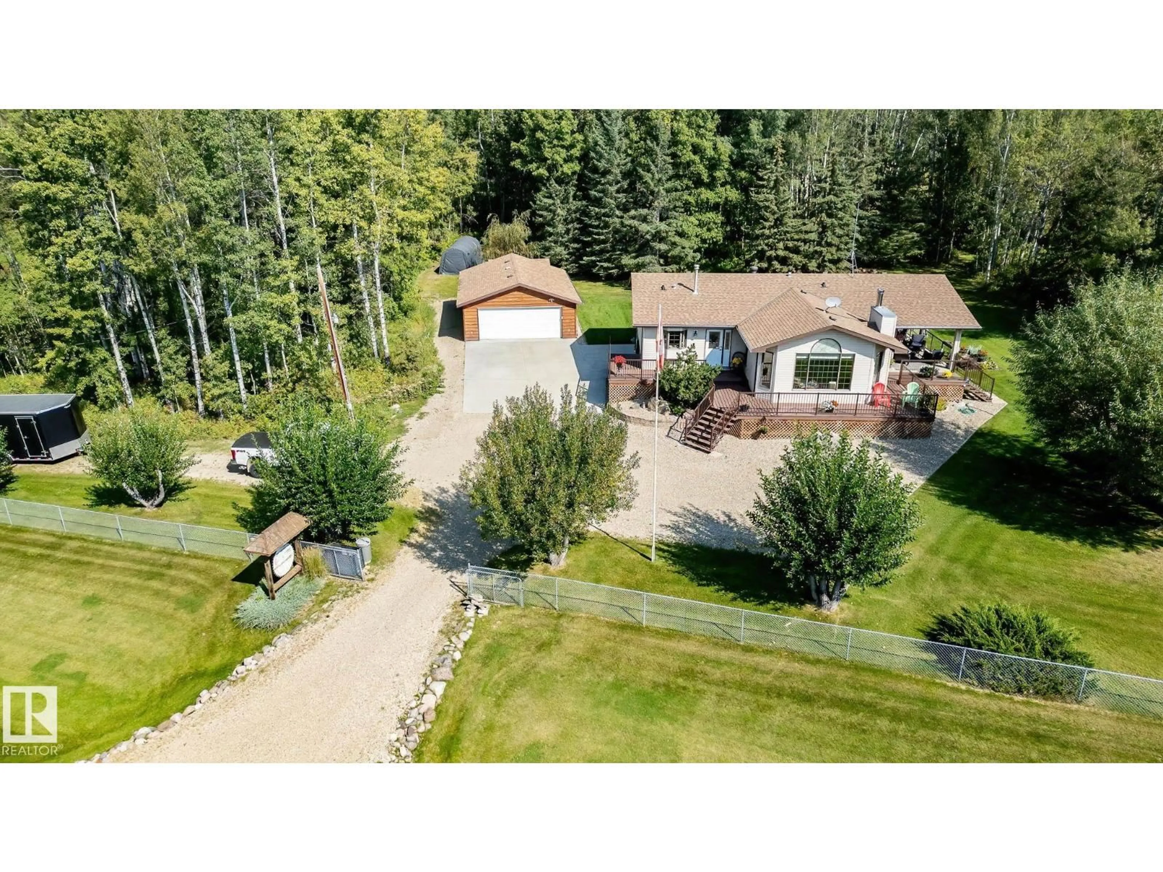 A pic from outside/outdoor area/front of a property/back of a property/a pic from drone, unknown for 4002 SCOTT AV, Rural Wetaskiwin County Alberta T0C2C0