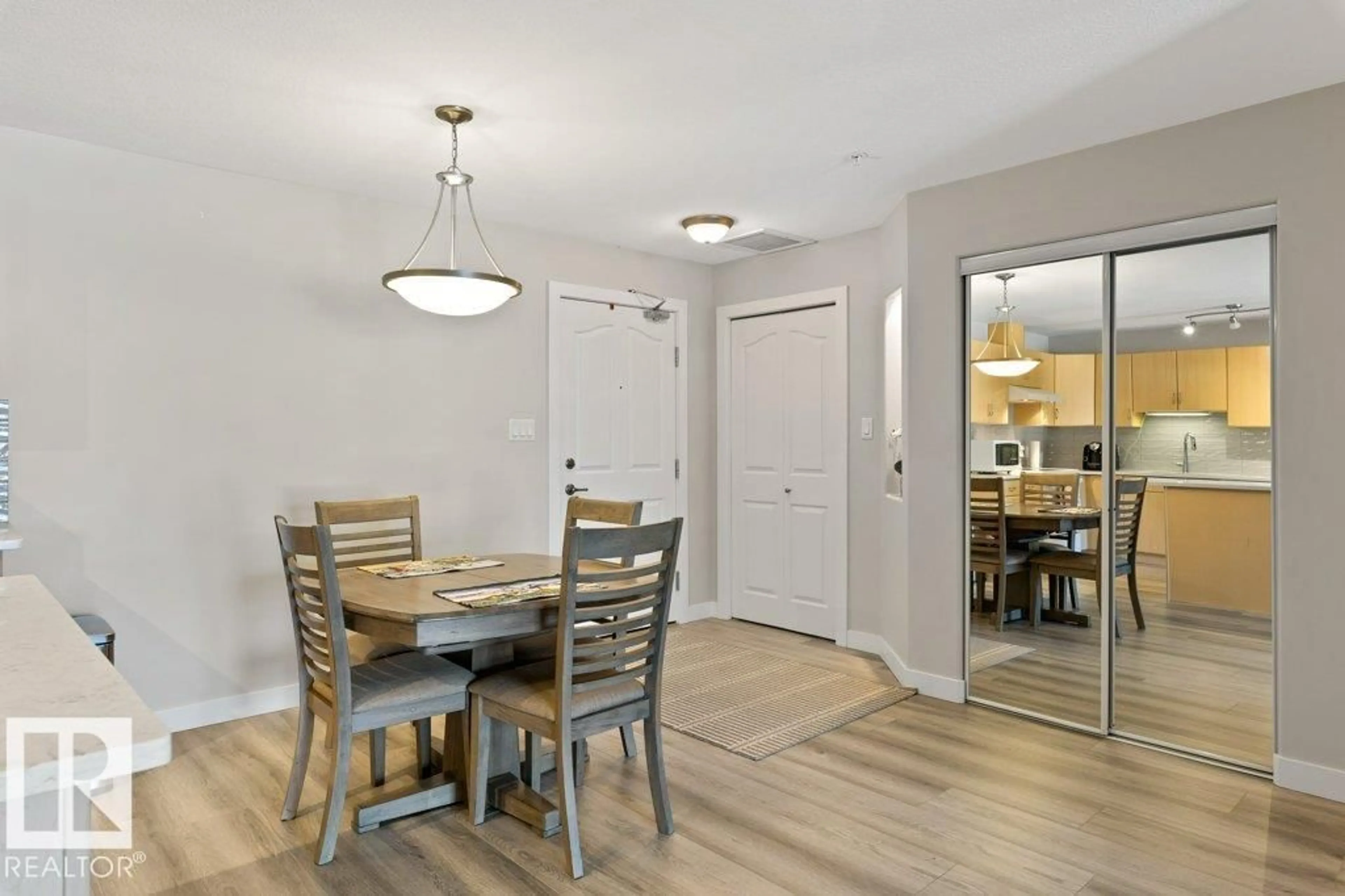 Dining room, wood/laminate floor for 78A - 224 MCKENNEY AV, St. Albert Alberta T8N7E6