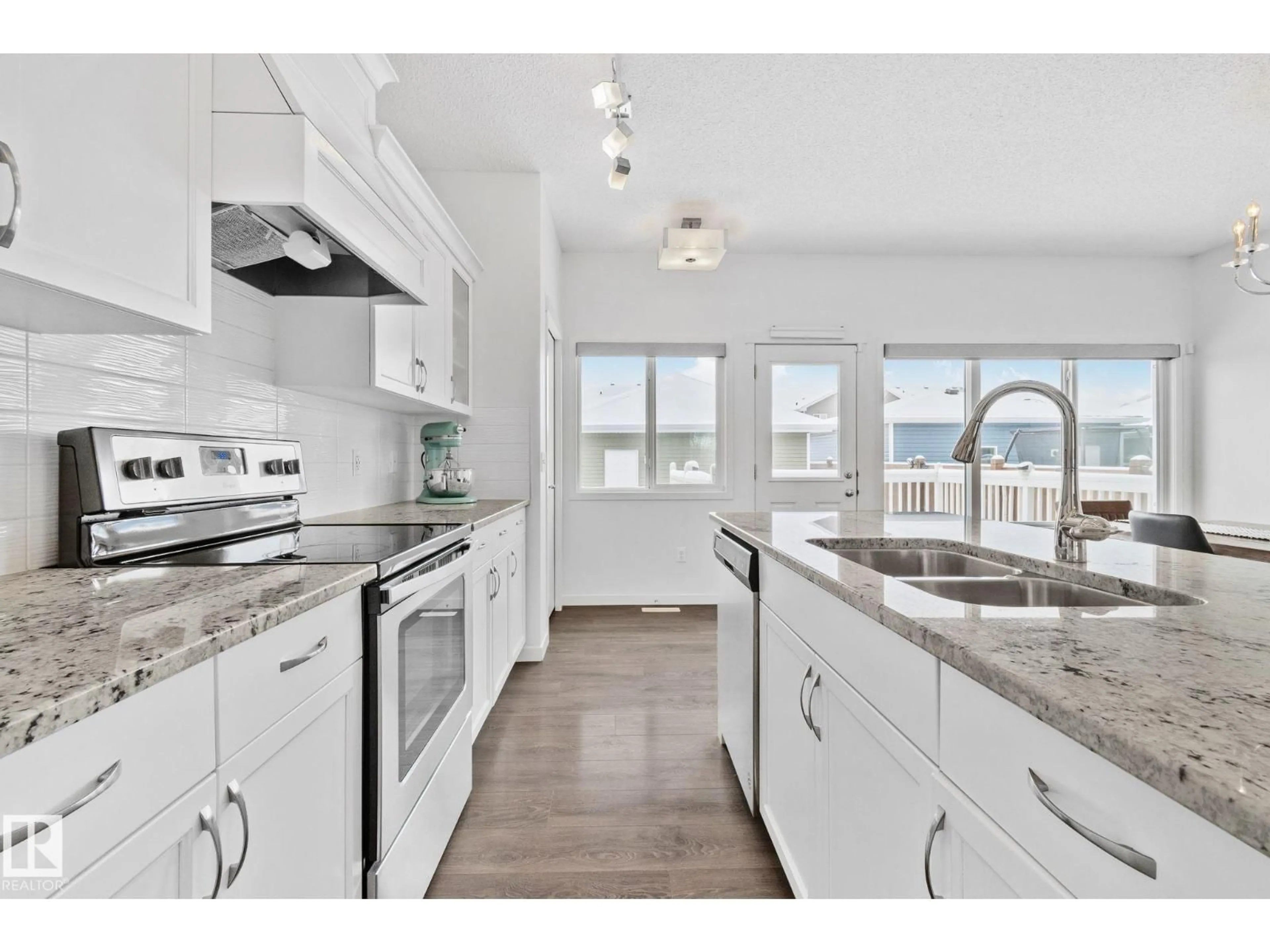 Open concept kitchen, unknown for 540 EBBERS WY, Edmonton Alberta T5Y3T8