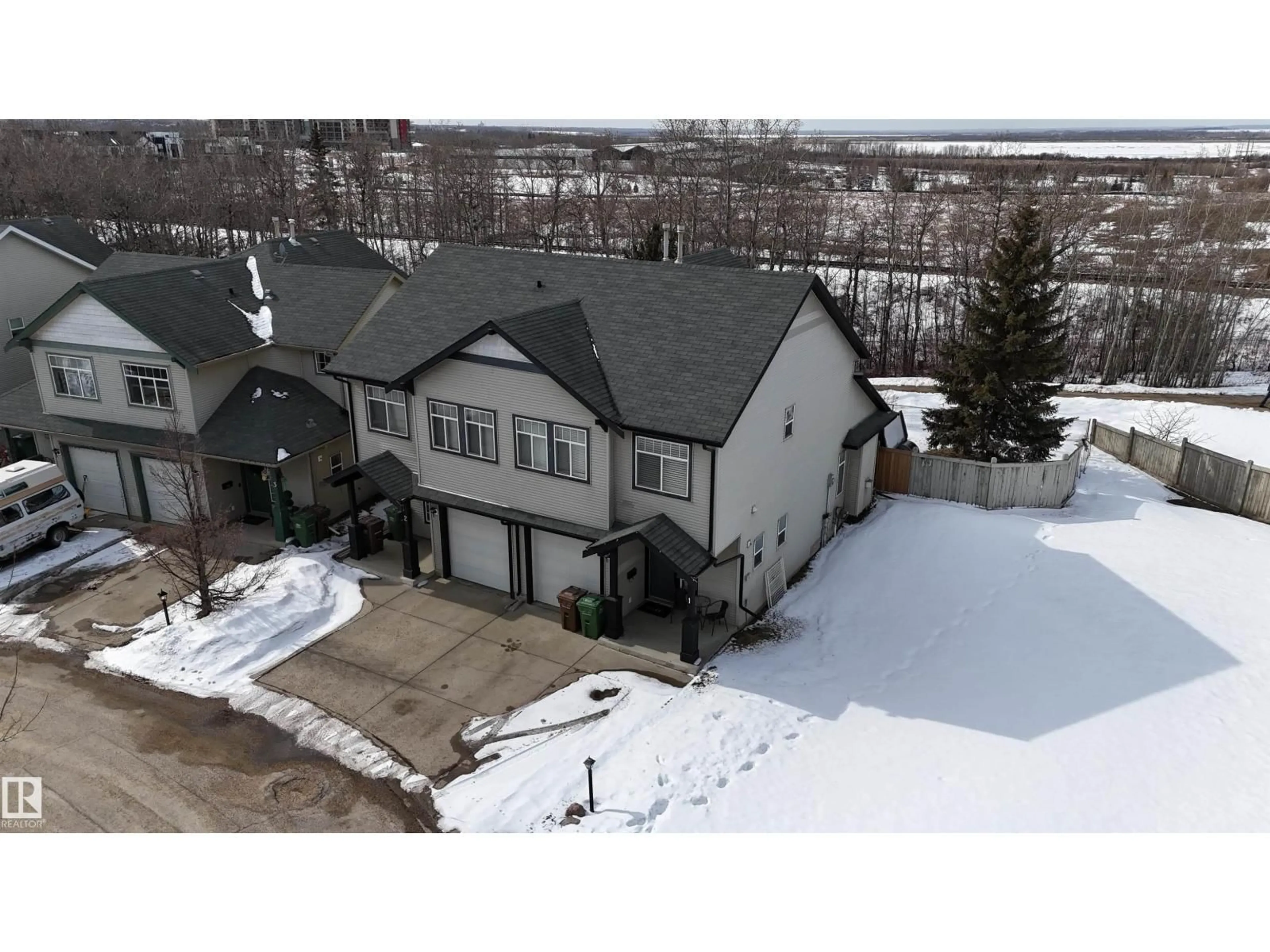 A pic from outside/outdoor area/front of a property/back of a property/a pic from drone, unknown for 30 LEVASSEUR RD, St. Albert Alberta T8N7A6