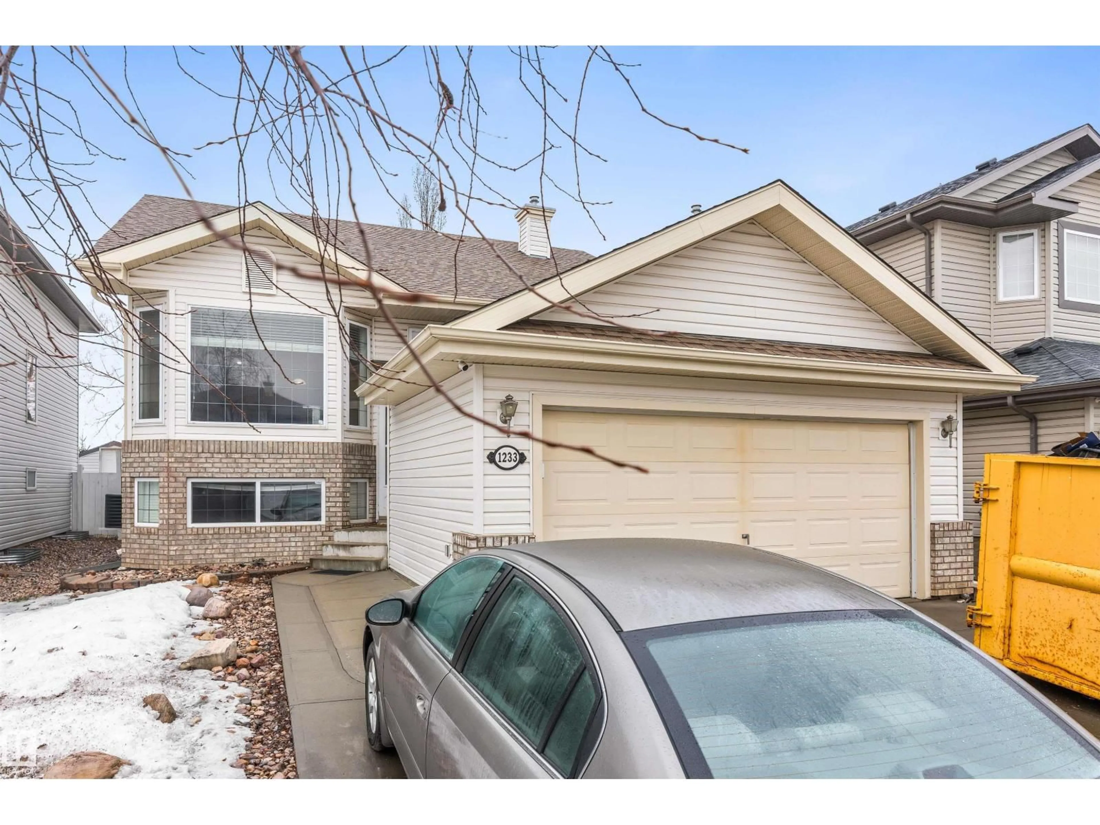 Home with vinyl exterior material, street for 1233 ORMSBY LN, Edmonton Alberta T5T6R2