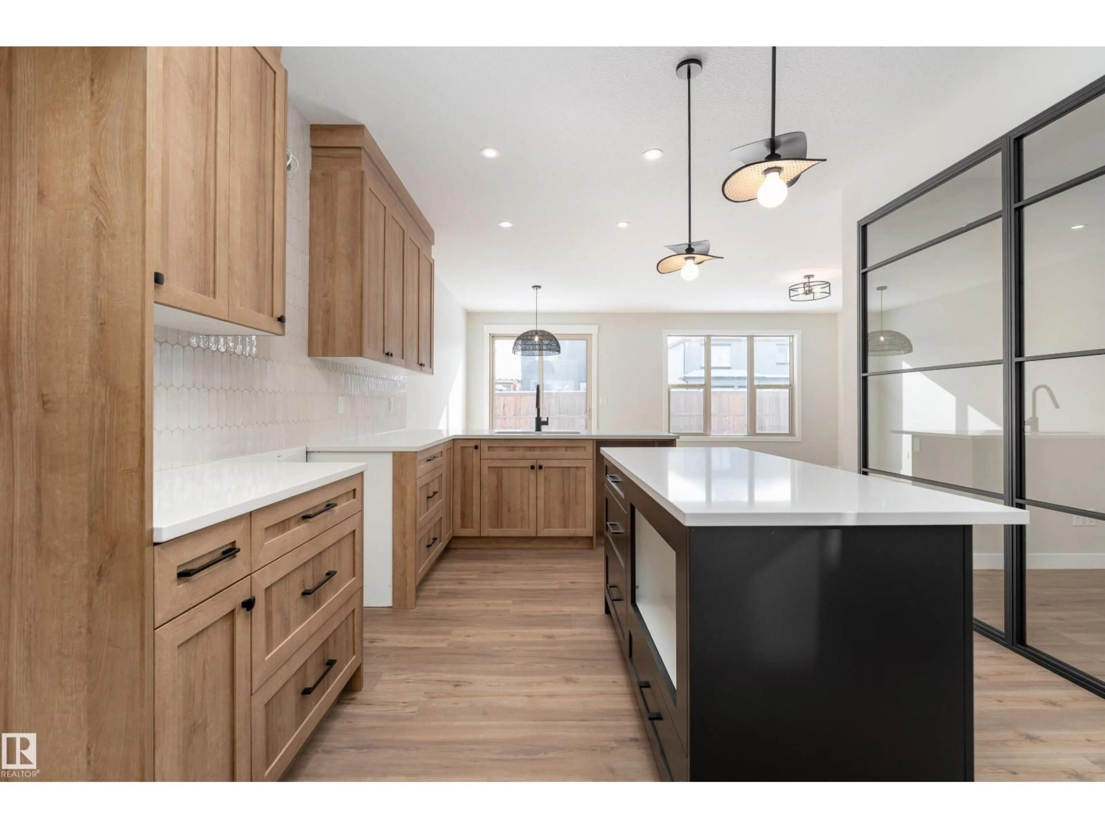 Open concept kitchen, wood/laminate floor for 10 GABLE CM, Spruce Grove Alberta T7X2W2