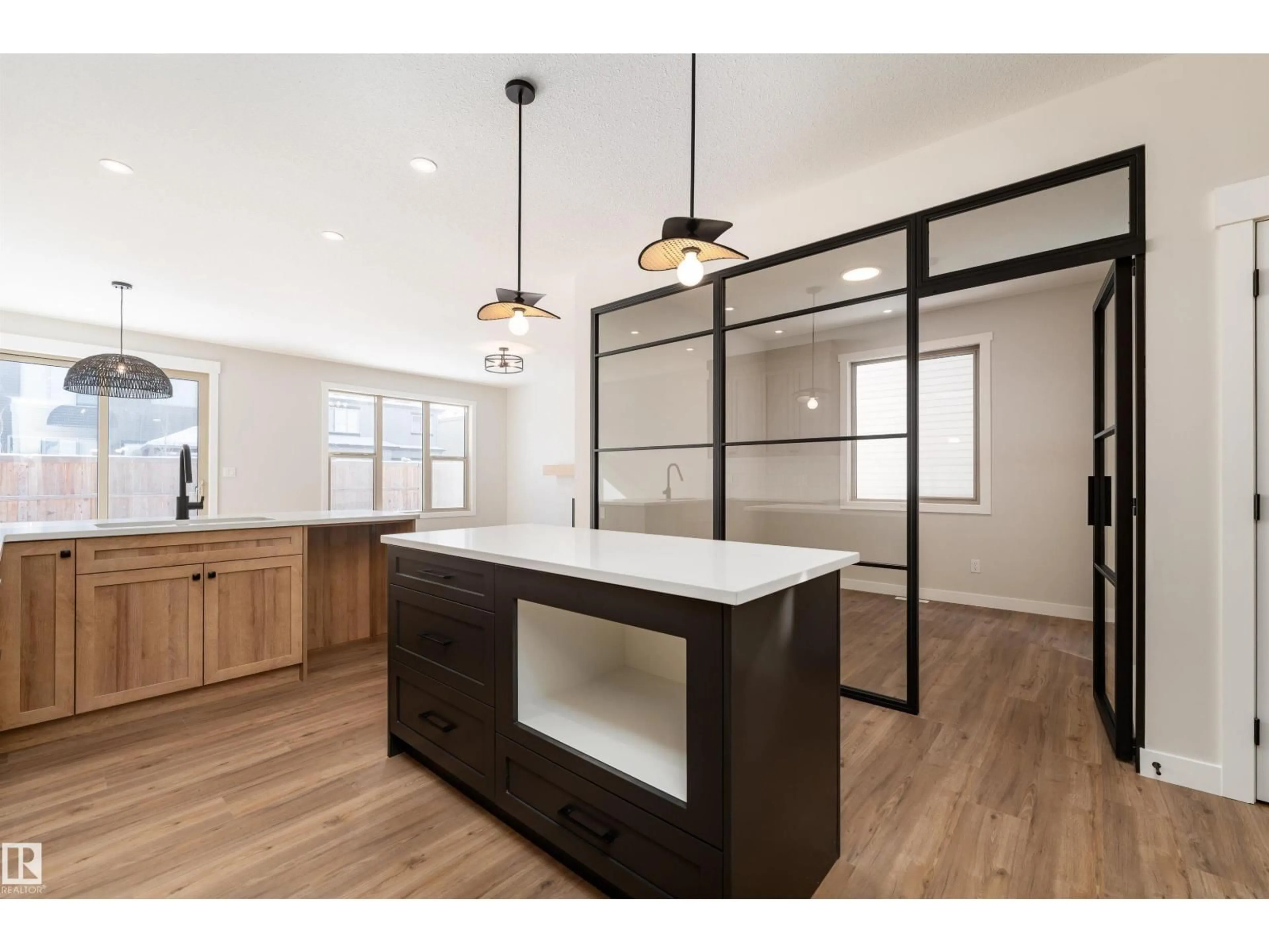 Open concept kitchen, wood/laminate floor for 10 GABLE CM, Spruce Grove Alberta T7X2W2